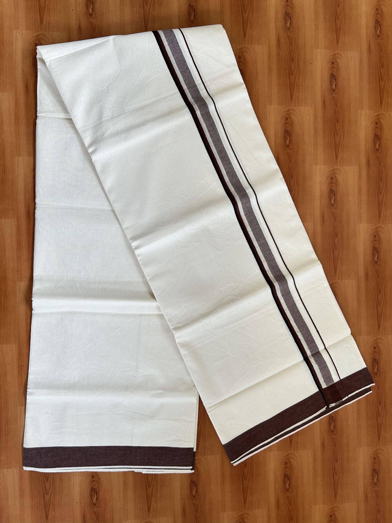 Single Mundu/Dhoti - Off White (Unbleached) 29% Discount !! KaithariKada Balaramapuram 100% Cotton Twisted 60s Thread - 1 Inch Silver Kasav & Black & Chocolate Brown Shaded Kara (2 meter /4 muzham) - 3 KK5393 GL