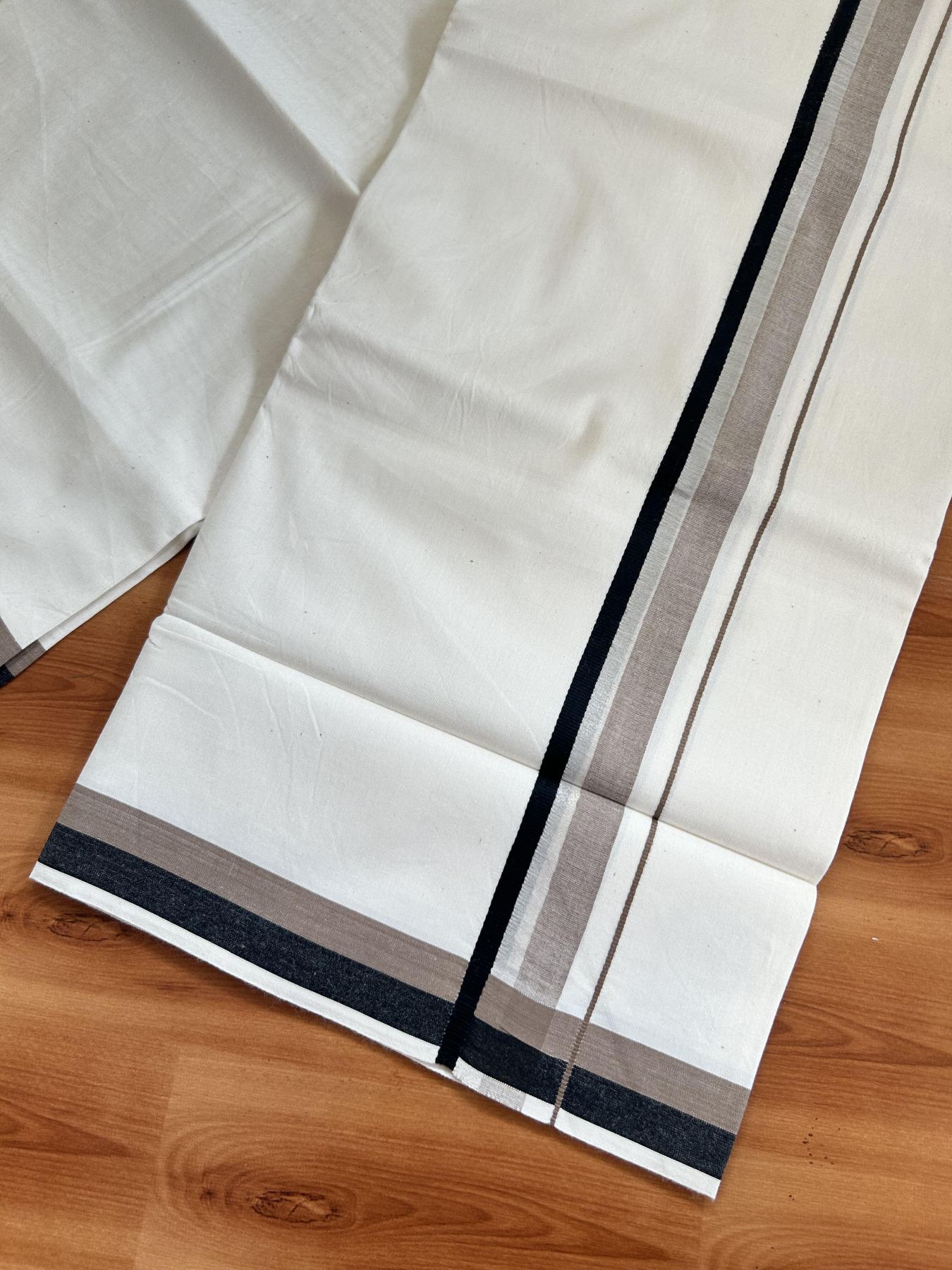 Single Mundu/Dhoti - Off White (Unbleached) 29% Discount !! KaithariKada Balaramapuram 100% Cotton Twisted 60s Thread - 1 Inch Silver Kasav & Black & Light Brown Shaded Kara (2 meter /4 muzham) - 8 KK5393 GL