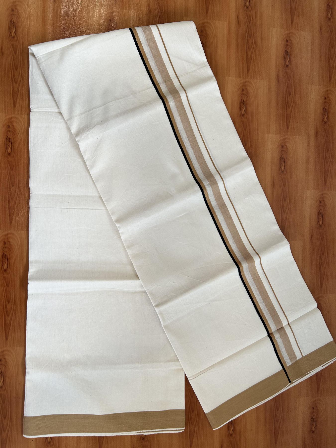 Single Mundu/Dhoti - Off White (Unbleached) 29% Discount !! KaithariKada Balaramapuram 100% Cotton Twisted 60s Thread - 1 Inch Silver Kasav & Black & Brownish Orange Shaded Kara (2 meter /4 muzham) - 2 KK5393 GL