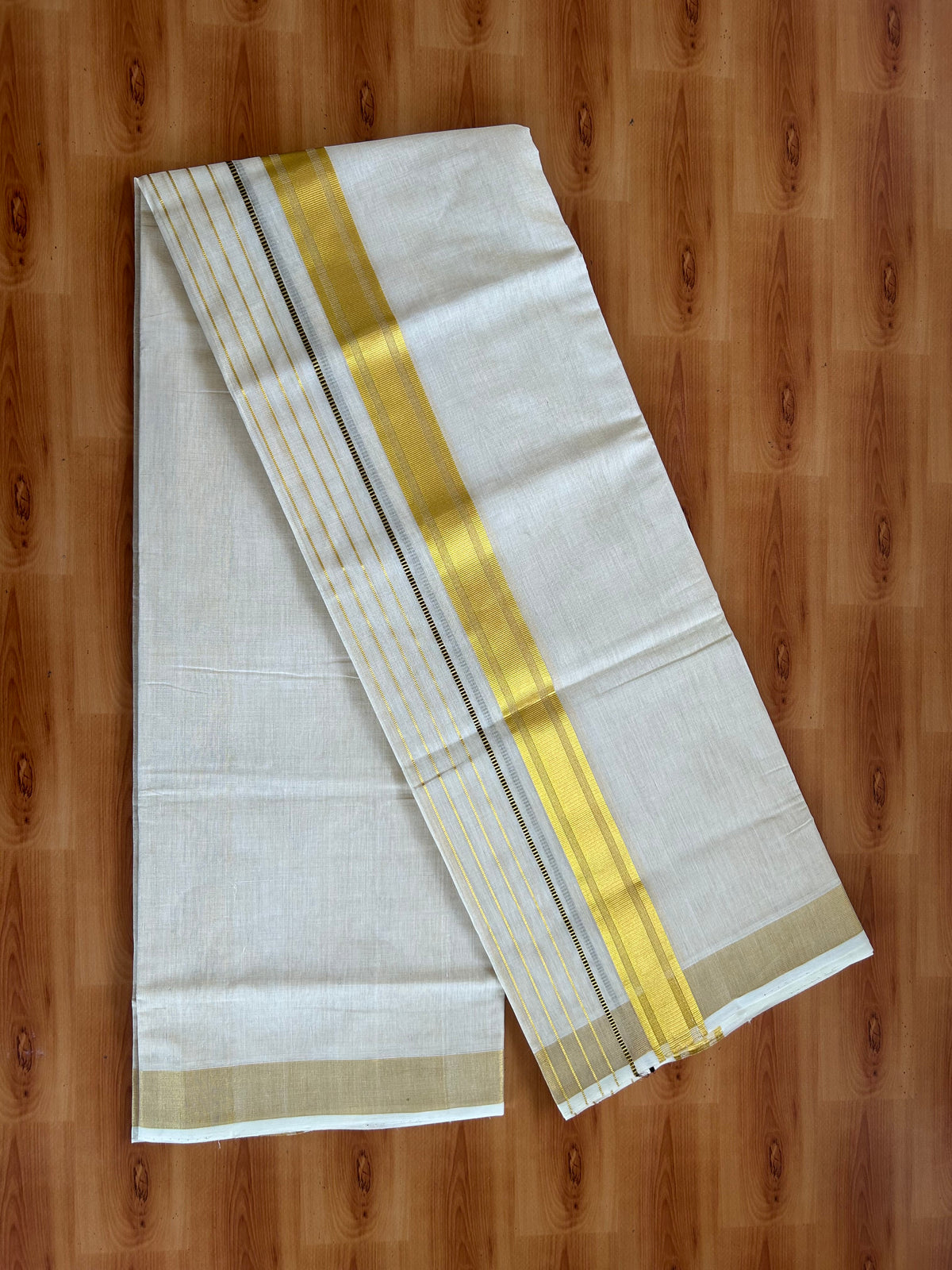 Double Off White - (Unbleached) Mundu/Dhoti - 25% Discount! KaithariKada Pulimood Handloom Millpaav - Pure Cotton - (80X90) - 6.5 inch Gold Kasav & Brown Striped Kara With Tissue Body 3.80 mtr (8 Muzham) - 1 KK5543 CED