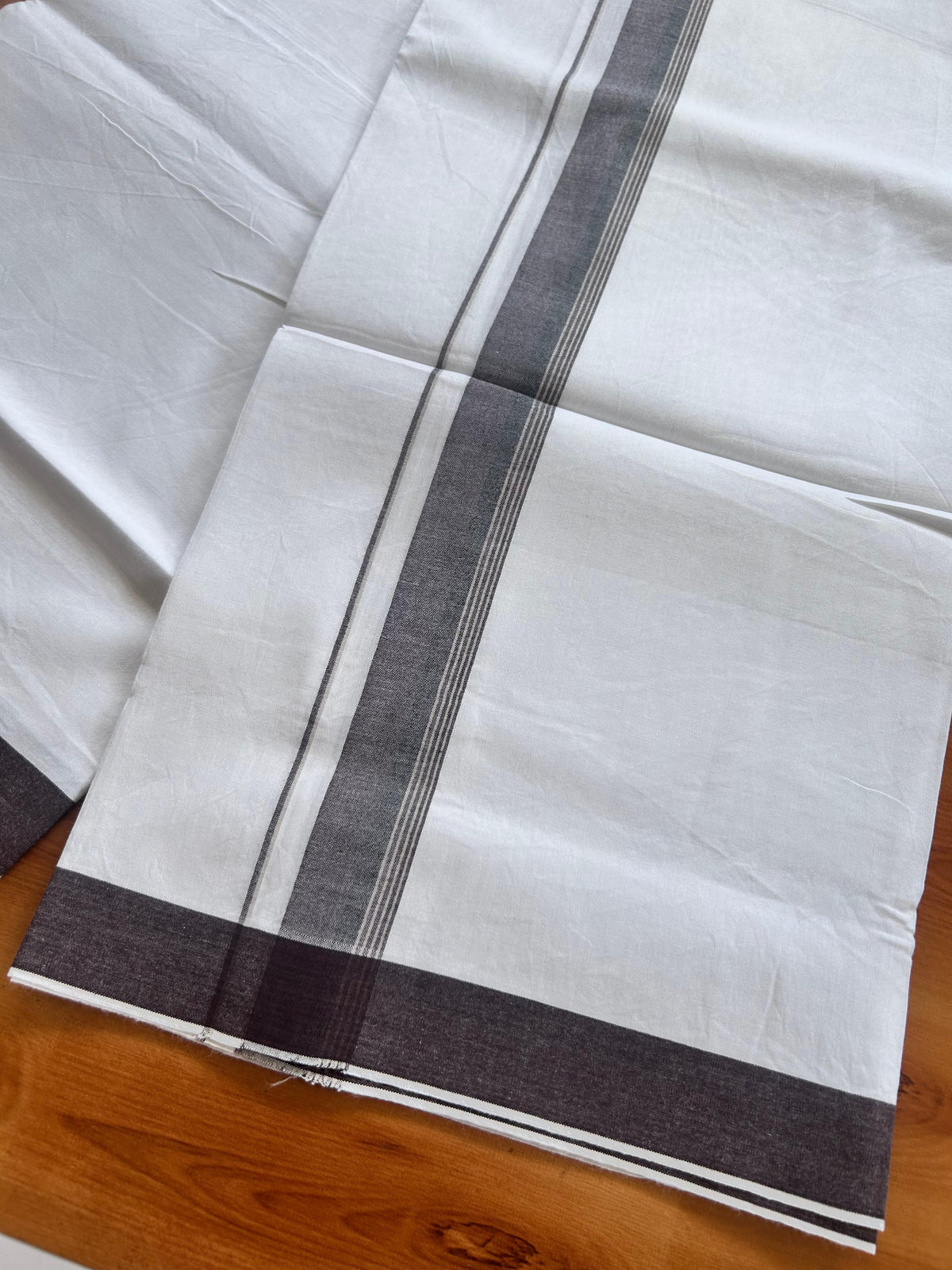 Single Mundu/Dhoti  - Pure White - KaithariKada Balaramapuram 100% Cotton - Twisted 60s Thread - 1 inch  Silver Kasav Black & Brown Shaded Striped Kara (2 meter / 4 muzham) - 17 KK5495 GL