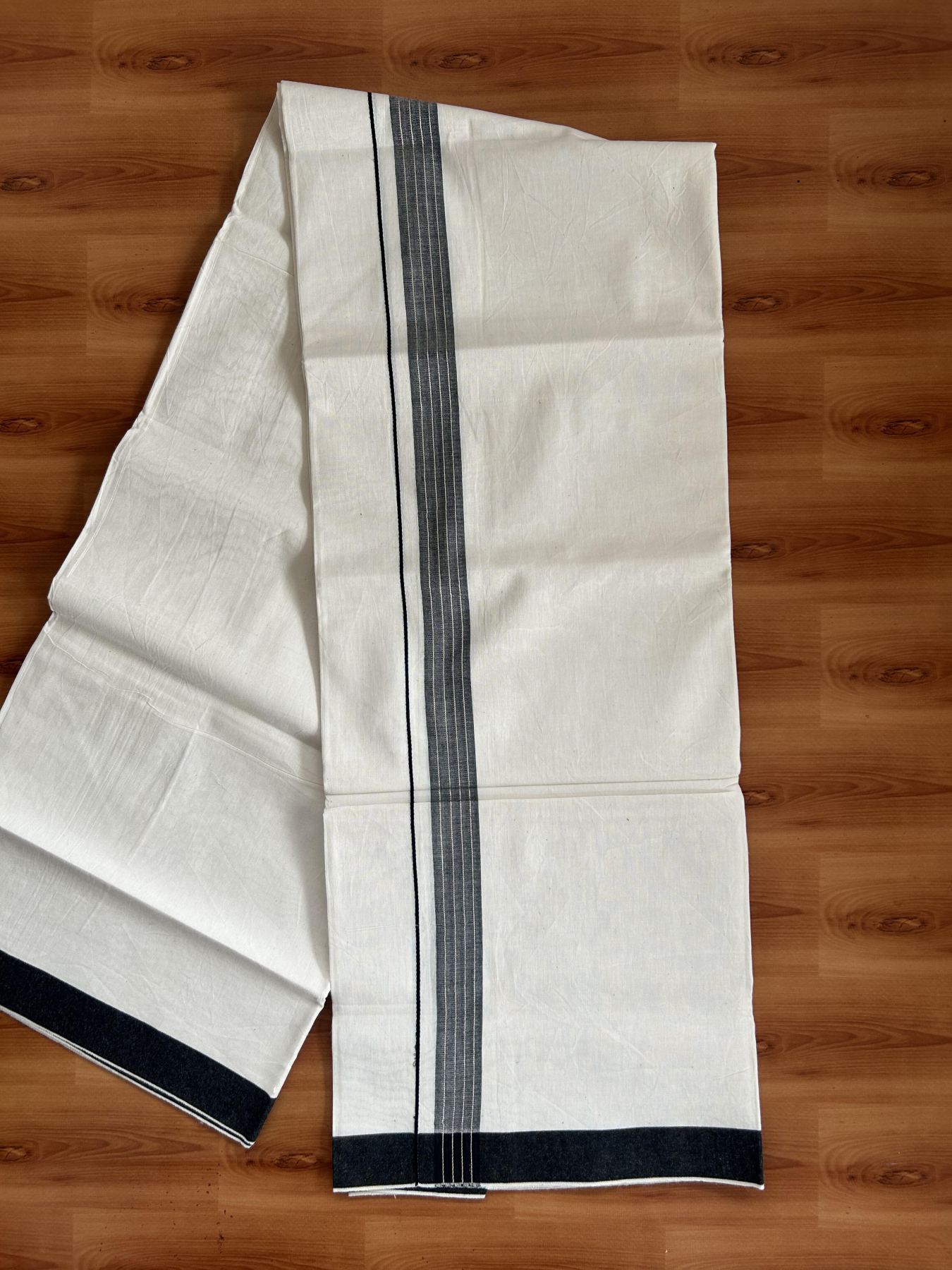 Single Mundu/Dhoti - Off White (Unbleached) 29% Discount !! KaithariKada Balaramapuram 100% Cotton Twisted 60s Thread - 1 Inch Silver Kasav & Black Shaded Striped Kara (2 meter /4 muzham) - 14 KK5393 GL