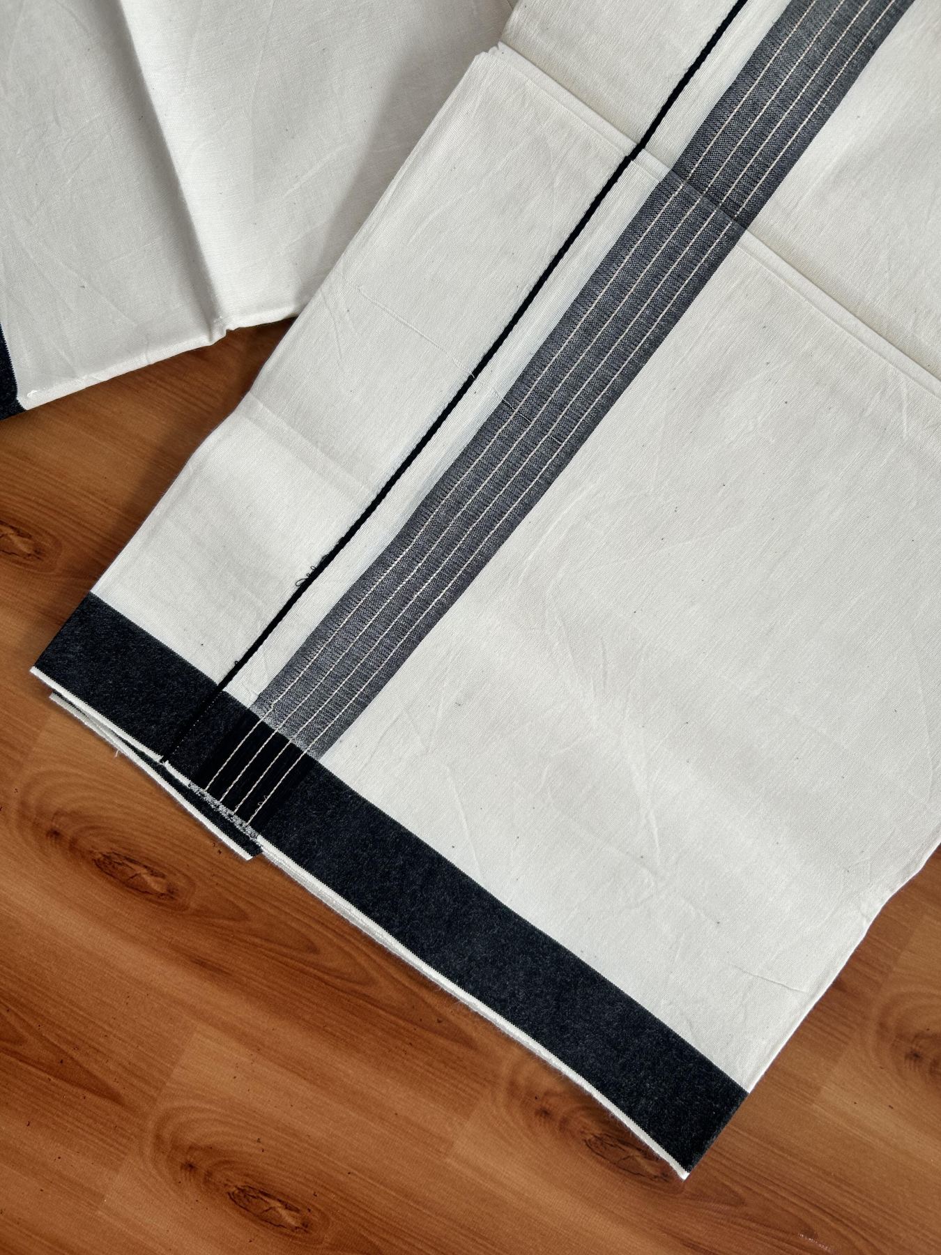 Single Mundu/Dhoti - Off White (Unbleached) 29% Discount !! KaithariKada Balaramapuram 100% Cotton Twisted 60s Thread - 1 Inch Silver Kasav & Black Shaded Striped Kara (2 meter /4 muzham) - 14 KK5393 GL