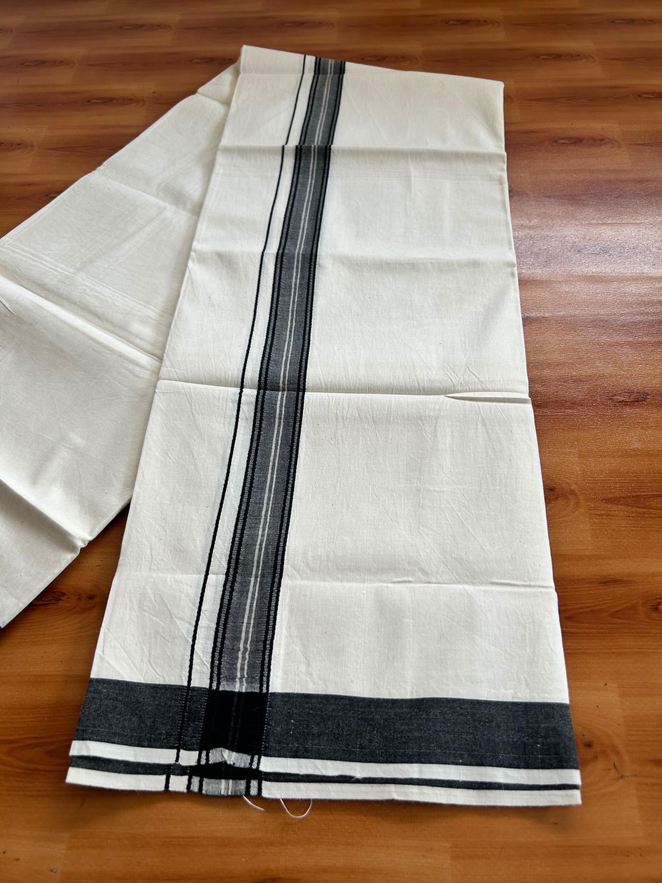 Single Off White (Unbleached) Mundu/Dhoti - 36% DISCOUNT!! KaithariKada Balaramapuram 100% Cotton - Twisted 60s Thread - 1.25 inch Silver Kasav Black Shaded Striped Kara (2 meter / 4 muzham) - 24 KK5495 GL