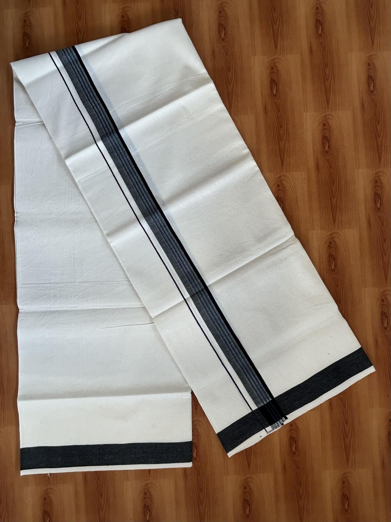 Single Mundu/Dhoti - Off White (Unbleached) 29% Discount !! KaithariKada Balaramapuram 100% Cotton Twisted 60s Thread - 1 Inch Peacock Blue & Black Shaded Striped Kara (2 meter /4 muzham) - 24 KK5393 GL