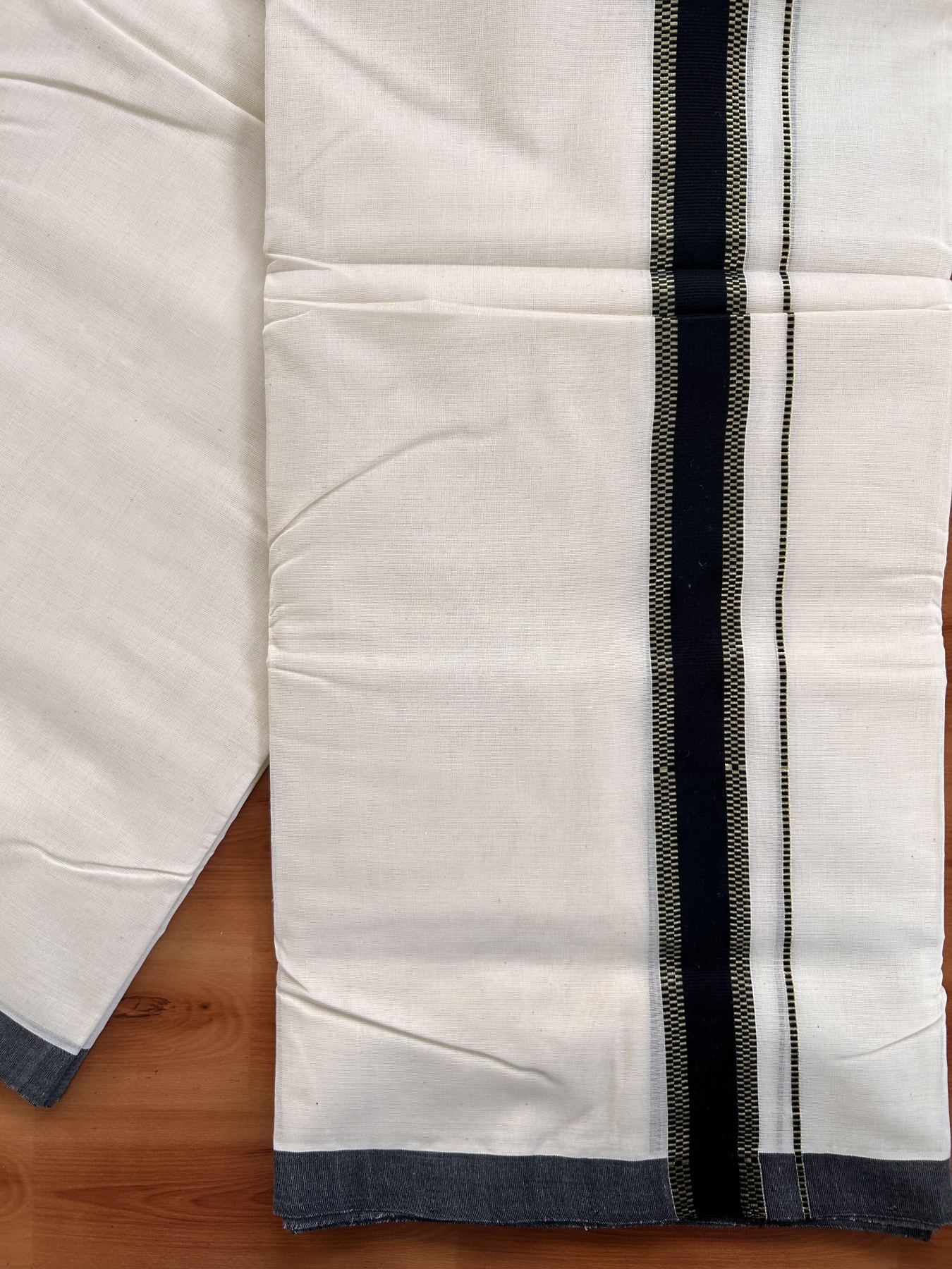 Double Off White (Unbleached) Mundu/Dhoti- 25% Discount! KaithariKada Handloom Millpaav - Kerala Handloom - Cotton - 80x90 - 1.5 inch Gold Kasav & Black Striped Kara 4 meter (8.5 Muzham) - 1 KK5430 RM
