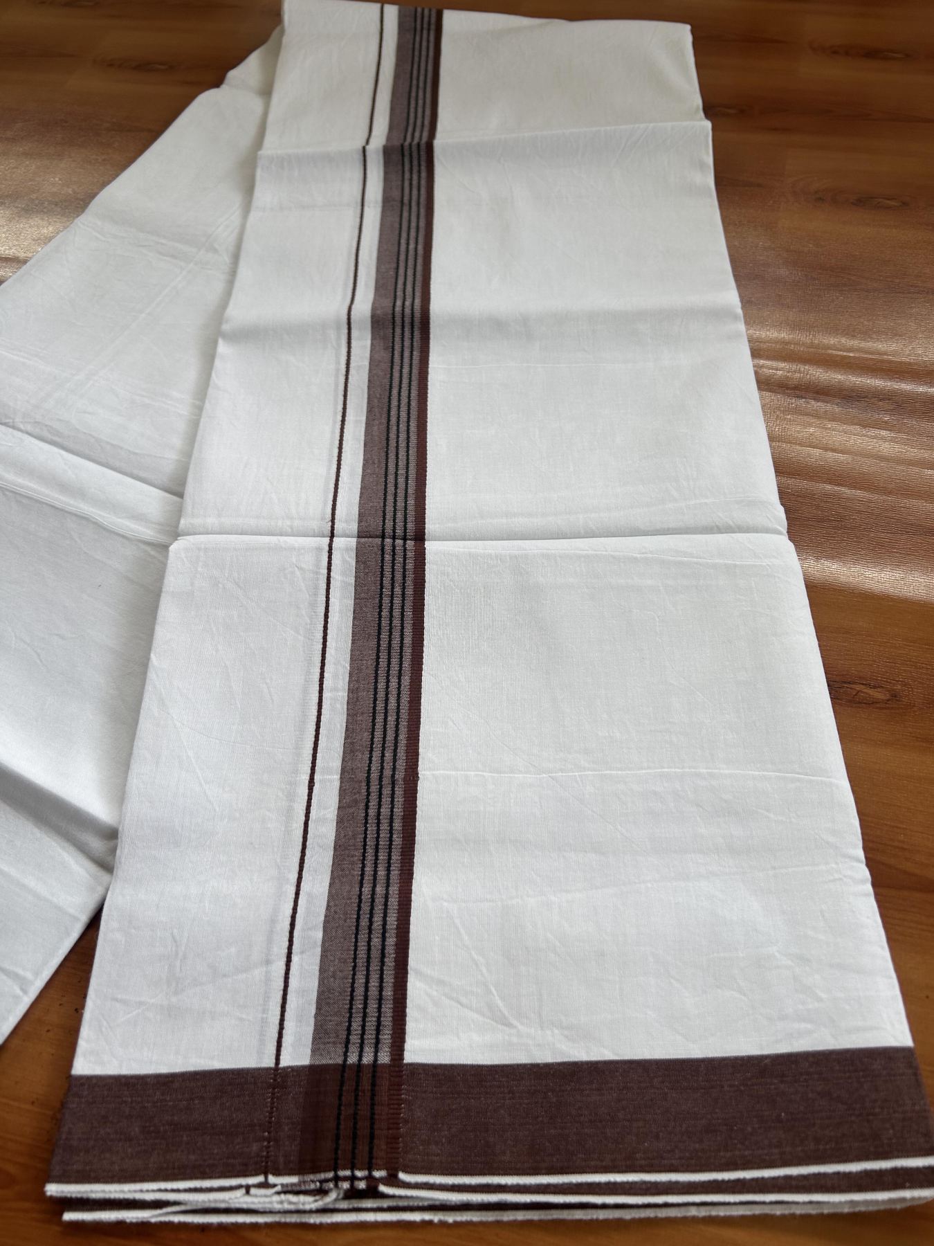 Single Mundu/Dhoti  - Pure White - 29% Discount !! KaithariKada Balaramapuram 100% Cotton - Twisted 60s Thread - 0.5 Cm  Black & Chocolate Brown Shaded Striped Kara (2 meter / 4 muzham) - 60 KK5393 GL