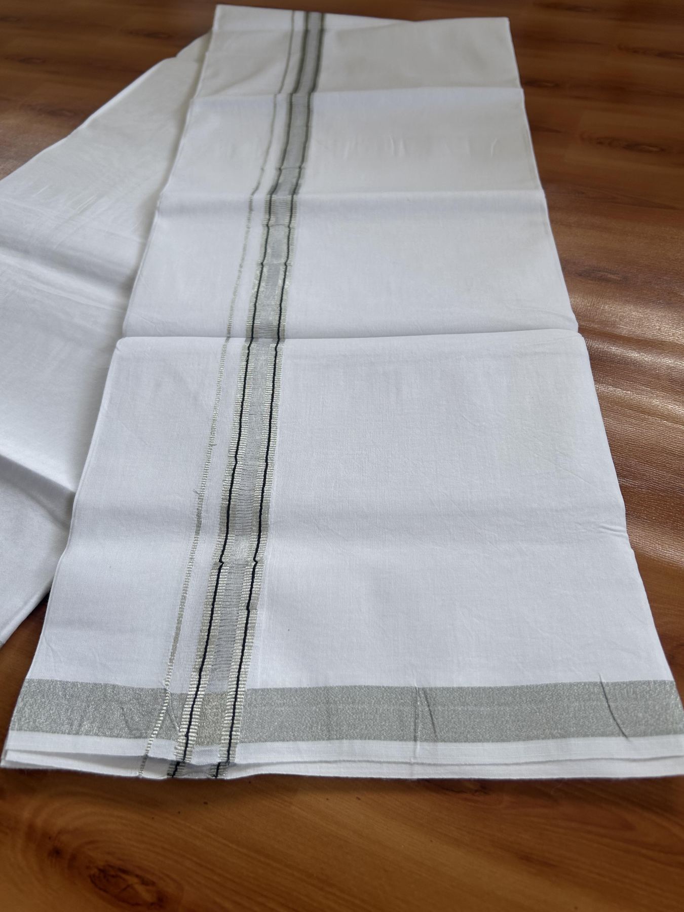 Single Mundu/Dhoti  - Pure white - 29% Discount !! KaithariKada Balaramapuram 100% Cotton - Twisted 60s Thread- 0.25 Inch Silver Kasav Black Striped Kara (2 meter / 4 muzham) - 57 KK5393 GL