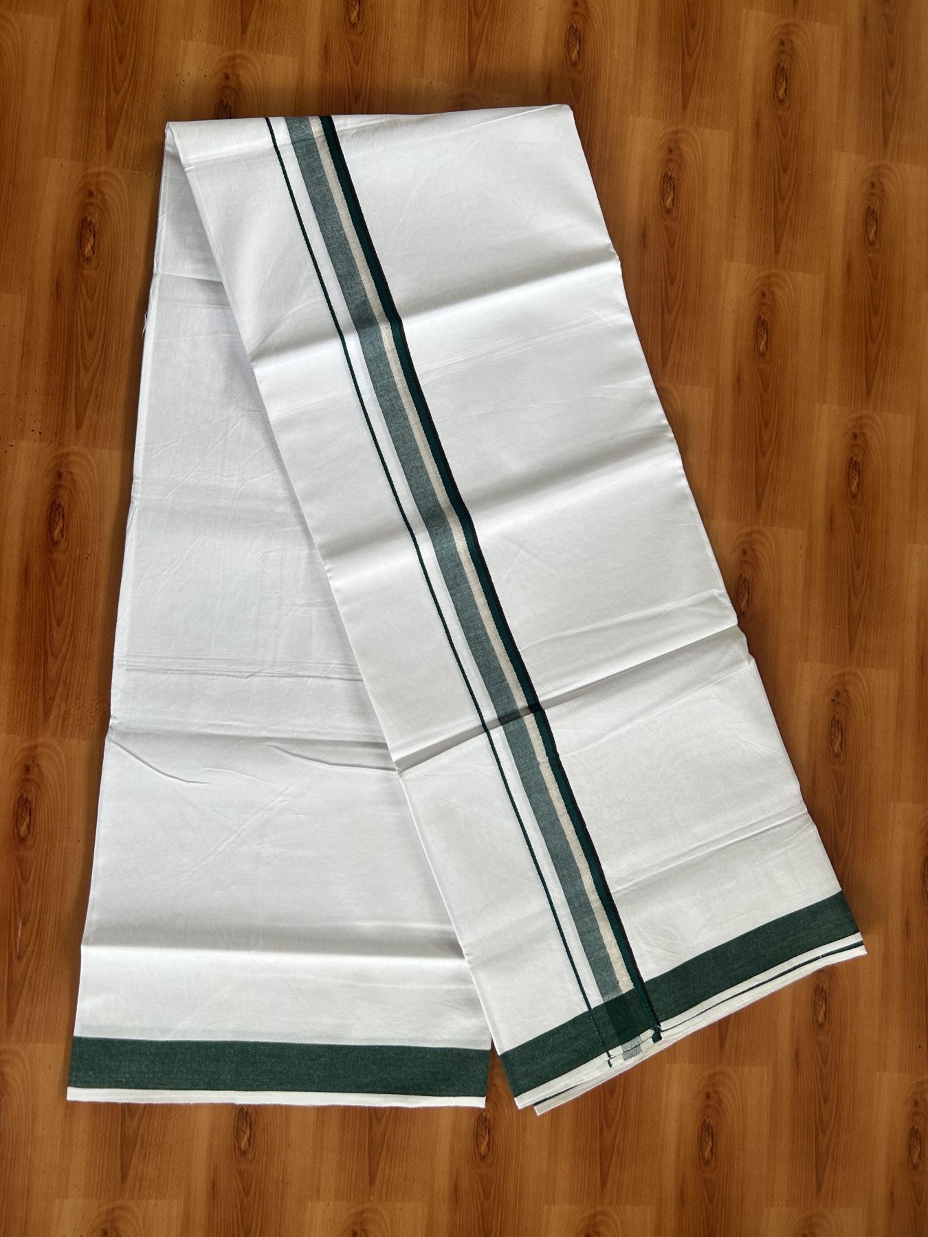 Single Mundu/Dhoti  - Pure White - 29% Discount !! KaithariKada Balaramapuram 100% Cotton - Twisted 60s Thread -1 Inch Silver Kasav & Black & Green Shaded Kara (2 meter / 4 muzham) - 29 KK5393 GL