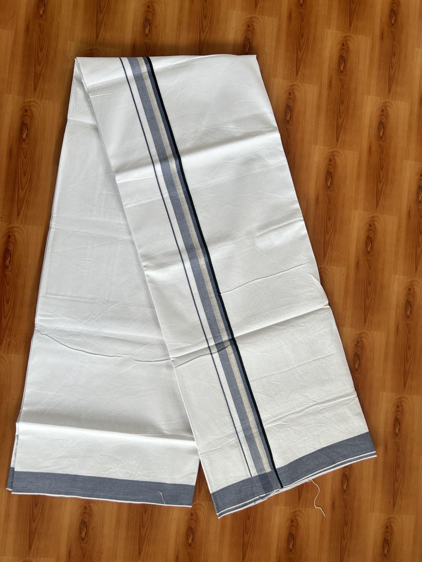 Single Mundu/Dhoti  - Pure White - 29% Discount !! KaithariKada Balaramapuram 100% Cotton - Twisted 60s Thread -1 Inch Silver Kasav & Black & Greyish Blue Shaded Kara (2 meter / 4 muzham) - 31 KK5393 GL