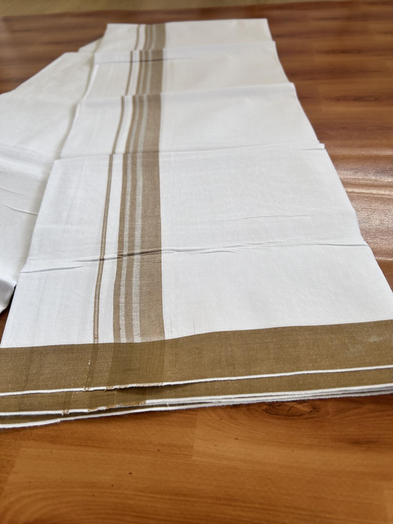 Single Mundu/Dhoti  - Pure White - 29% Discount !! KaithariKada Balaramapuram 100% Cotton - Twisted 60s Thread -1 Inch Silver Kasav & Sand Brown Shaded Striped Kara (2 meter / 4 muzham) - 39 KK5393 GL