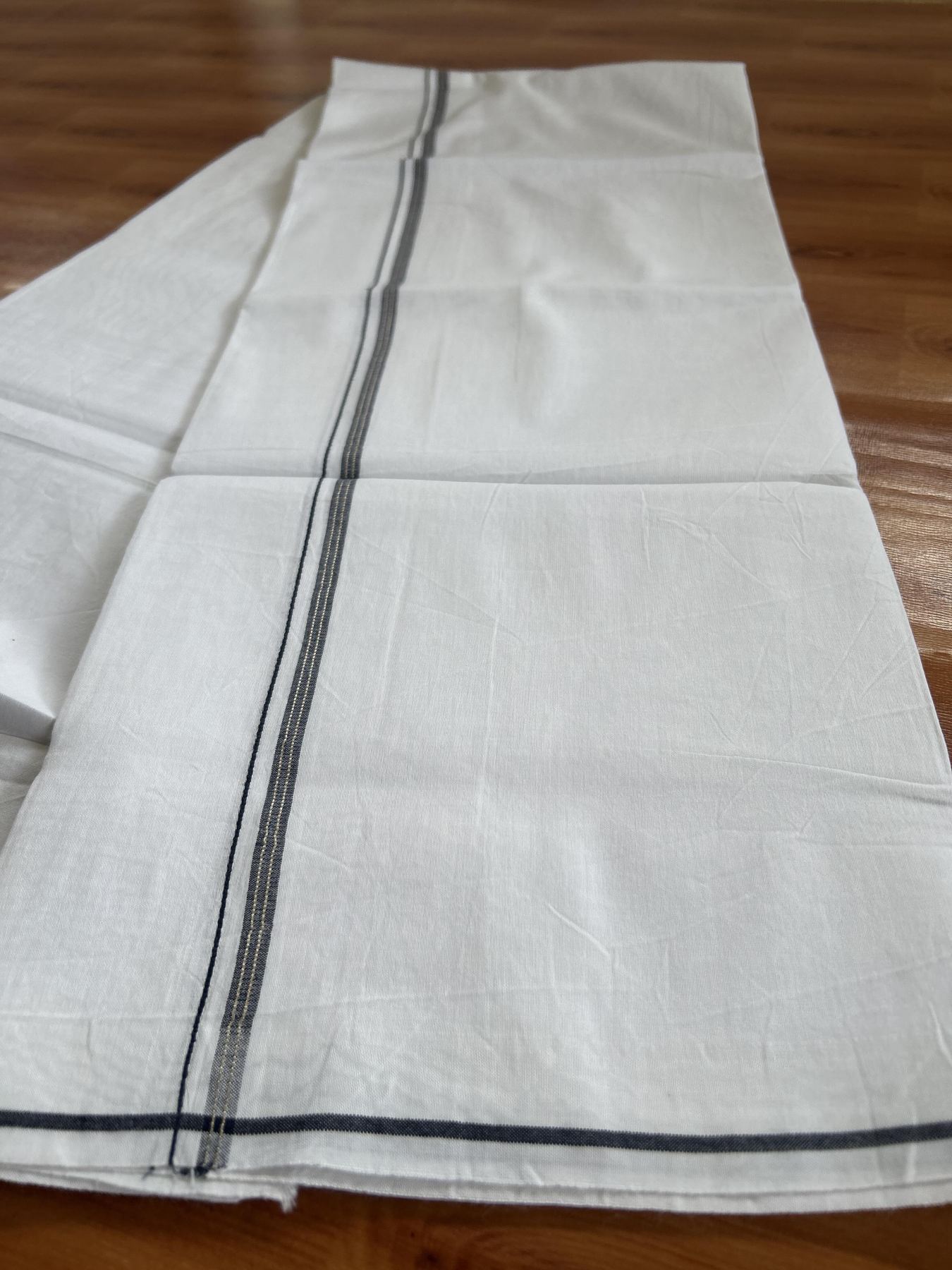 Single Mundu/Dhoti  - Pure White - 29% Discount !! KaithariKada Balaramapuram 100% Cotton - Twisted 60s Thread - 0.5 Cm Silver Kasav & Navy Blue Shaded Striped Kara (2 meter / 4 muzham) - 45 KK5393 GL