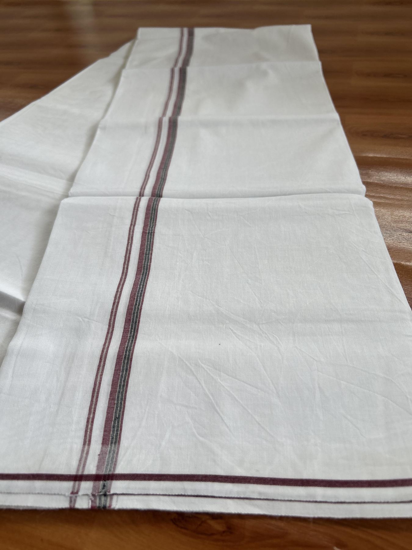 Single Mundu/Dhoti  - Pure White - 29% Discount !! KaithariKada Balaramapuram 100% Cotton - Twisted 60s Thread - 0.5 Cm Silver Kasav & Black & Light Maroon Shaded Striped Kara (2 meter / 4 muzham) - 64 KK5393 GL