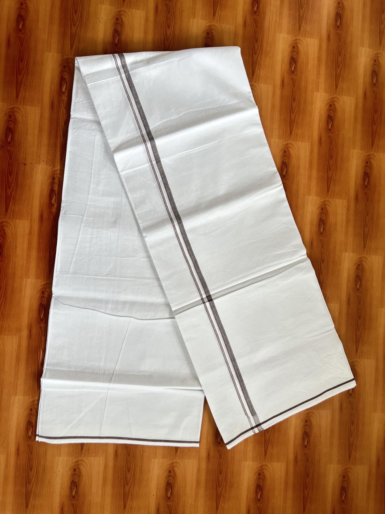 Single Mundu/Dhoti  - Pure White - 29% Discount !! KaithariKada Balaramapuram 100% Cotton - Twisted 60s Thread - 0.5 Cm Silver Kasav & Black & Brown Shaded Striped Kara (2 meter / 4 muzham) - 62 KK5393 GL