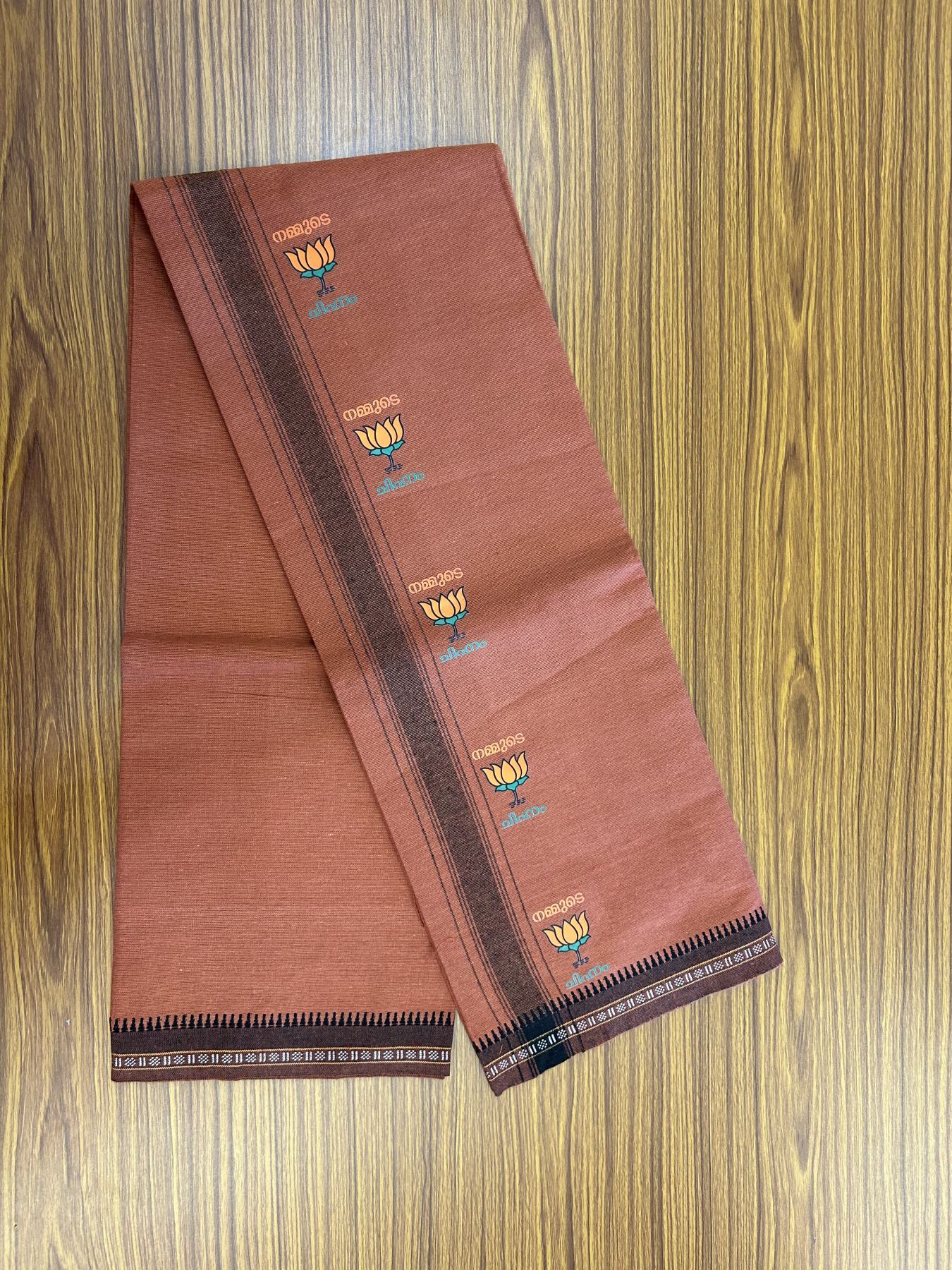 Bjp Veshti - Kaitharikada -  Single Kaily / Lungi - Polyster + Cotton - 20s twisted -  3.5 inch Black striped Bjp Lotus Printed Kuppadam Border with Kavi colour body (2 meter / 4 muzham)  - 12 KK8045 GAN