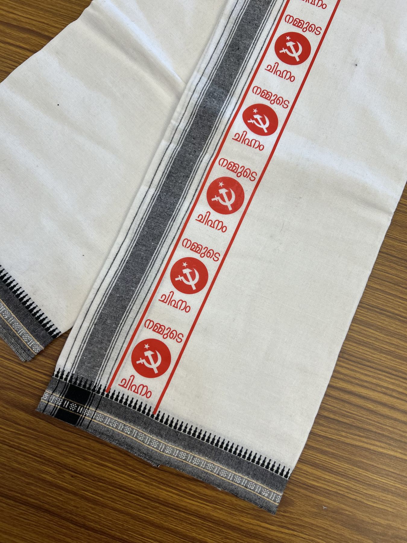 Cpi(M) Veshti - Kaitharikada -  Single Kaily / Lungi - Polyster + Cotton - 20s twisted -  3.75 inch Cpi(M) Arival Chuttika Nakshathram Printed Kuppadam Border with White colour body (2 meter / 4 muzham)  - 10 KK8045 GAN