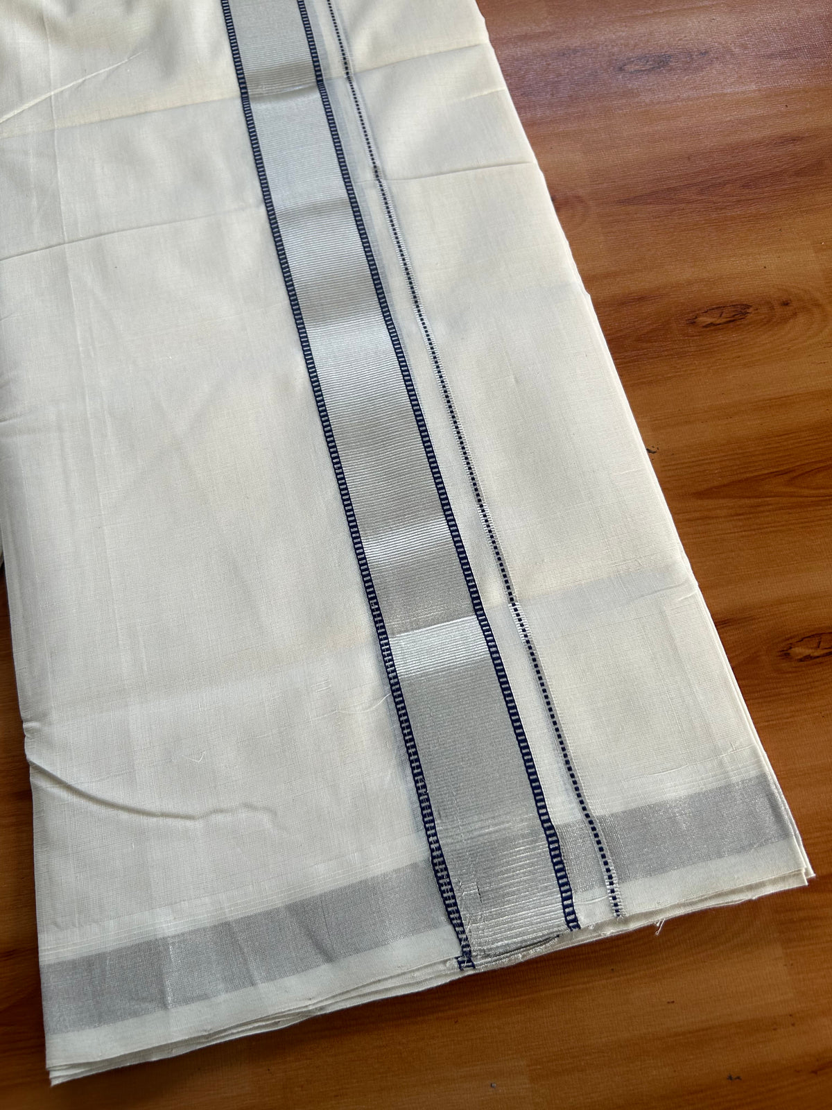 Double Off White (Unbleached) Mundu/Dhoti - 25% Discount! KaithariKada Handloom Unakkupaav Kerala Handloom - Pure Cotton - 80x90 - 1.5 Inch Silver Kasav & Navy Blue Kara 4 Mtr (8.5 Muzham) - 3 KK5551 STH