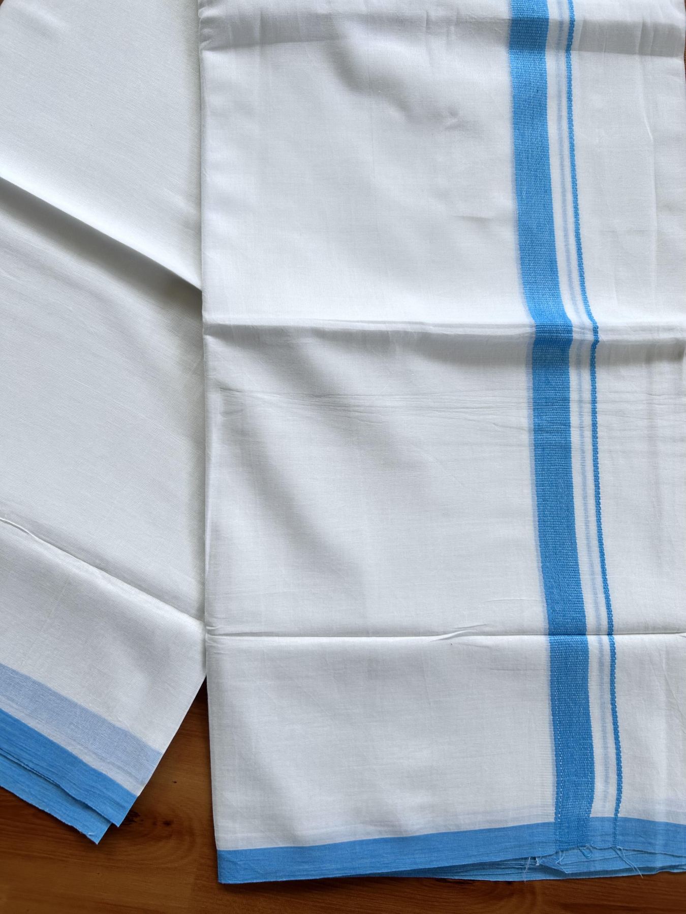 Double Pure White Mundu/Dothi - 20% Discount ! Kaitharikada Balaramapuram Cotton - 60s - 0.75 Inch Sky Blue Kara 3.90 mtr (8 muzham) - 25 KK5437 VAS