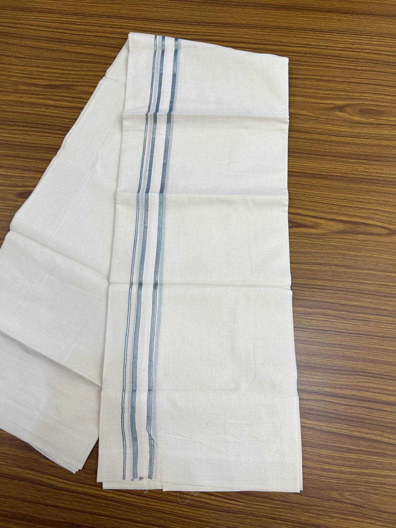 20% Discount!! KaithariKada Balaramapuram Pure Cotton Double Off White - (Unbleached) - Mundu/Dhoti - 100x80 - 1 inch Puliyilakkara Silver Kasav & Turquoise Blue Stripes One Side Chutty Kara 4 mtr (8.5 muzham) - 36 KK5357 VAS