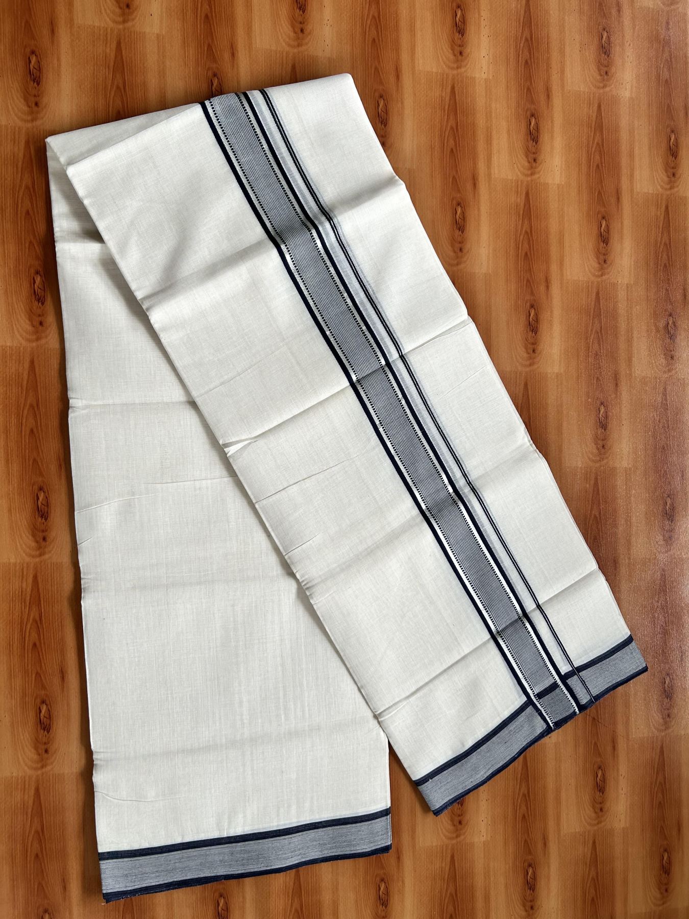 Double Off White (Unbleached) Mundu/Dhoti - 25% Discount! KaithariKada Handloom Unakkupaav Kerala Handloom - Pure Cotton - 80x90 - 1.5 Inch Silver Kasav & Navy Blue Striped Kara  4 Mtr (8.5 Muzham) - 17 KK5438 YAR