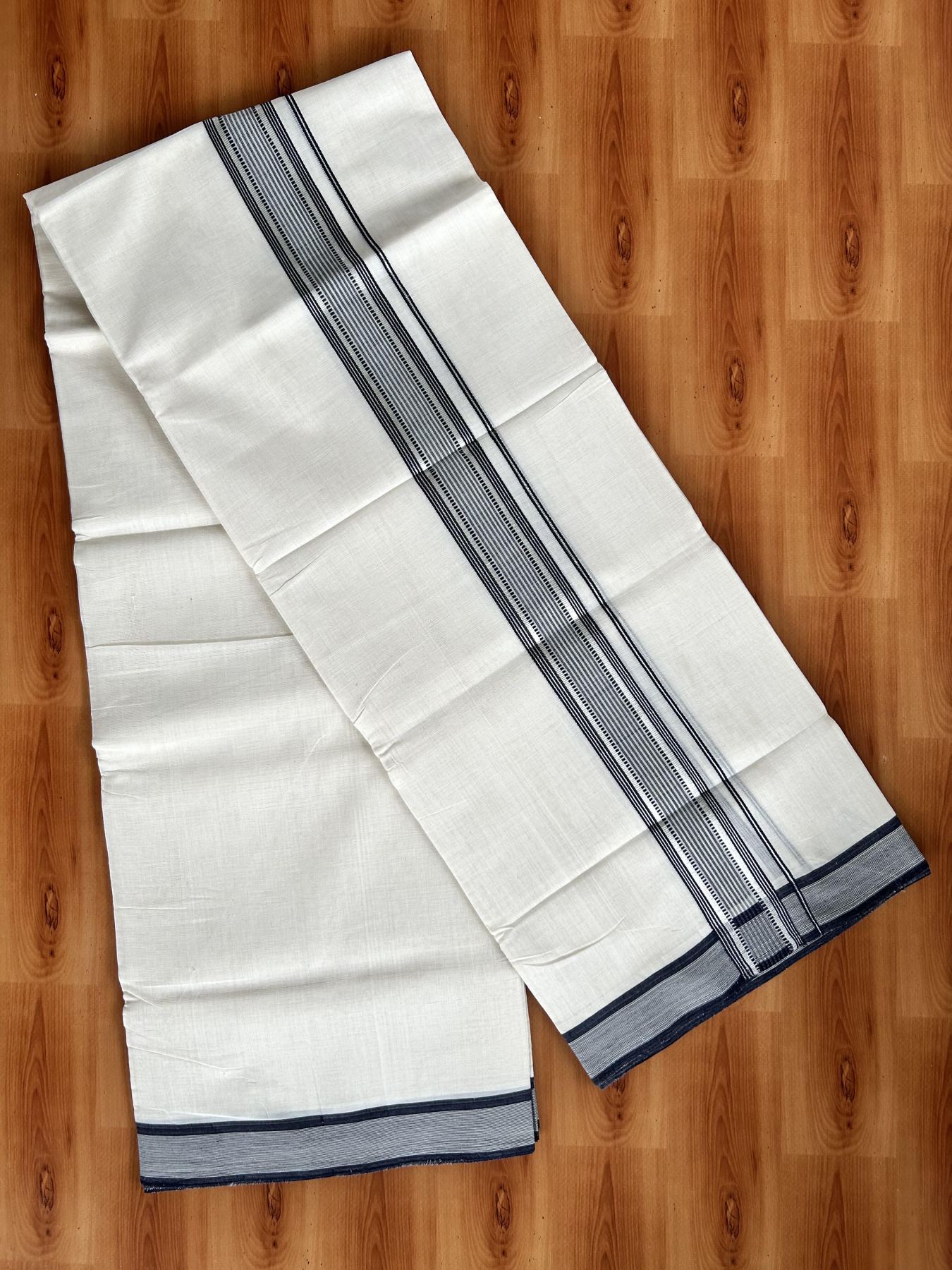 Double Off White (Unbleached) Mundu/Dhoti - 25% Discount! KaithariKada Handloom Unakkupaav Kerala Handloom - Pure Cotton - 80x90 - 1.5 Inch Silver Kasav & Navy Blue Striped Kara  4 Mtr (8.5 Muzham) - 16 KK5438 YAR