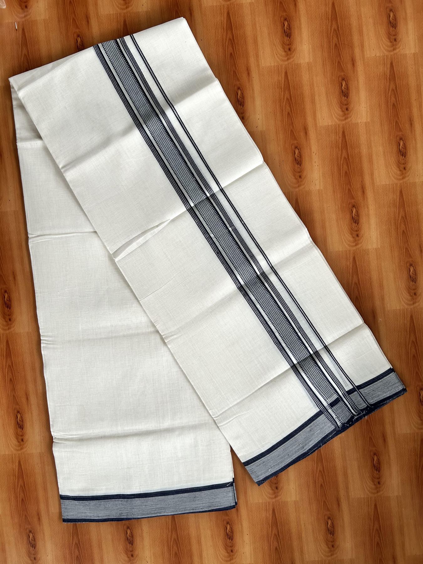 Double Off White (Unbleached) Mundu/Dhoti - 25% Discount! KaithariKada Handloom Unakkupaav Kerala Handloom - Pure Cotton - 80x90 - 1.5 Inch Silver Kasav & Navy Blue Striped Kara  4 Mtr (8.5 Muzham) - 15 KK5438 YAR