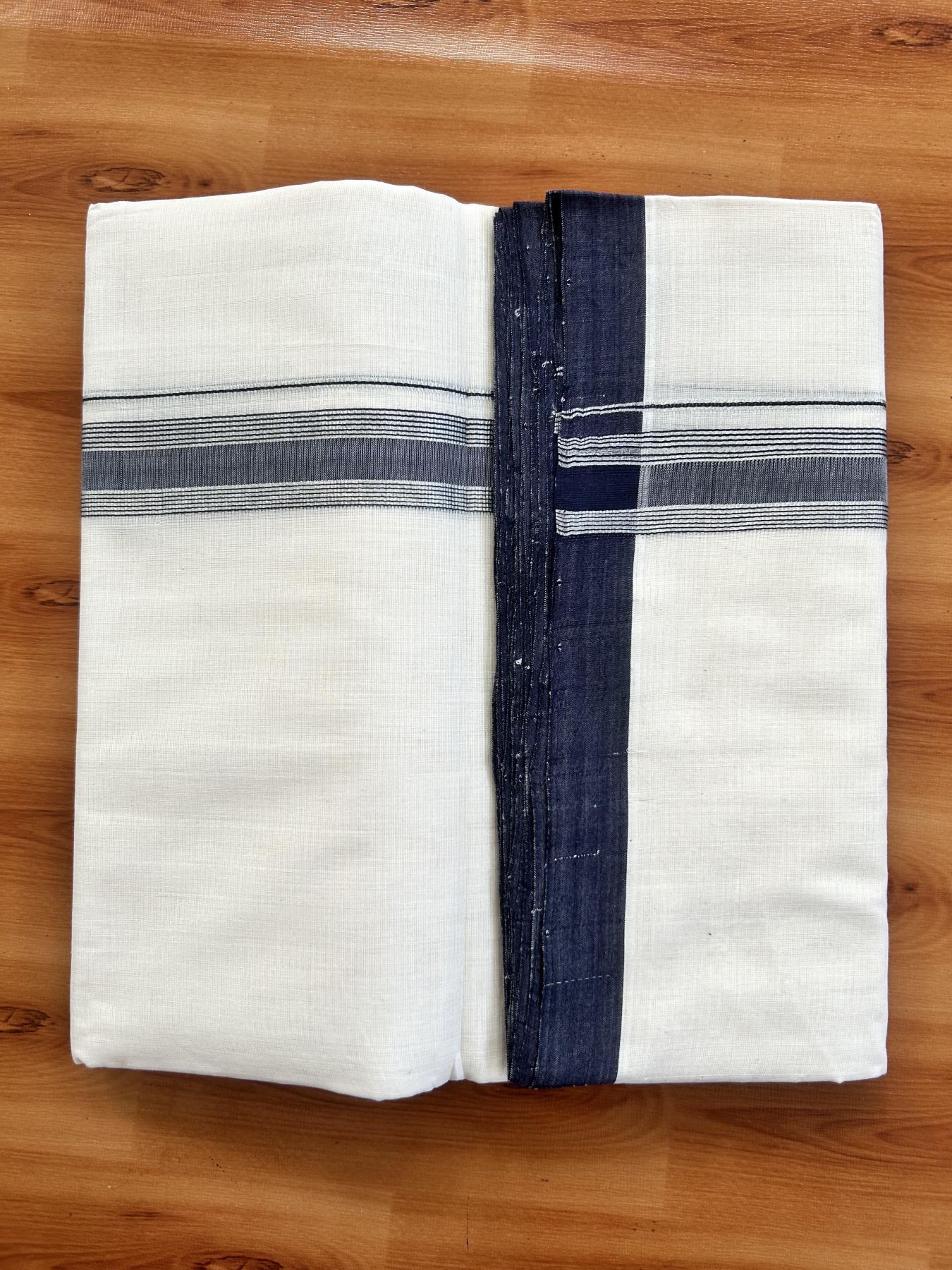 Double Off White (Unbleached) Mundu/Dhoti - 25% Discount! KaithariKada Handloom Unakkupaav Kerala Handloom - Pure Cotton - 80x90 - 1.25 Inch Silver Kasav & Navy Blue Shaded Striped Kara 4.50 Mtr (10 Muzham) - 29 KK5438 YAR