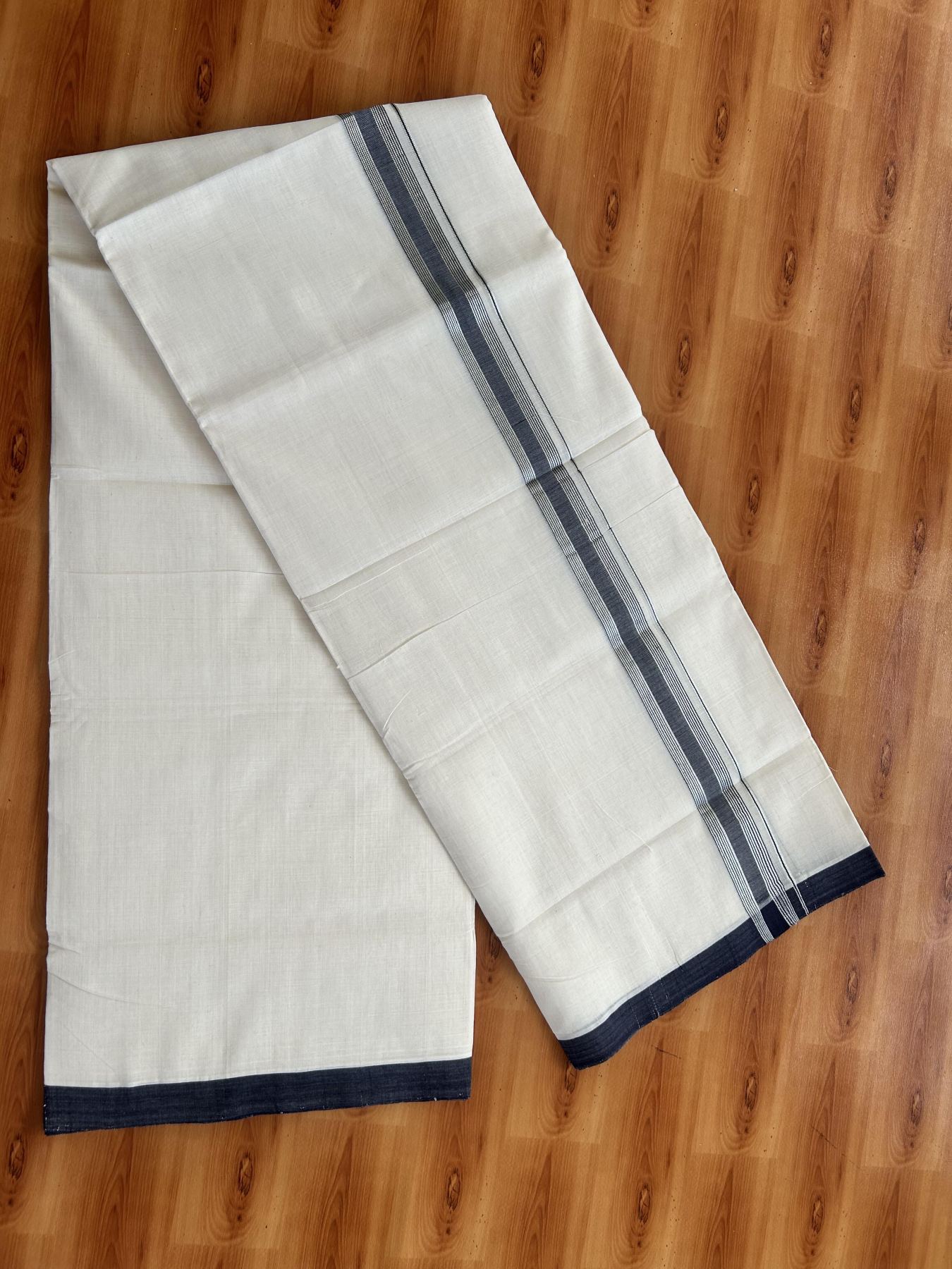 Double Off White (Unbleached) Mundu/Dhoti - 25% Discount! KaithariKada Handloom Unakkupaav Kerala Handloom - Pure Cotton - 80x90 - 1.25 Inch Silver Kasav & Navy Blue Shaded Striped Kara 4.50 Mtr (10 Muzham) - 29 KK5438 YAR
