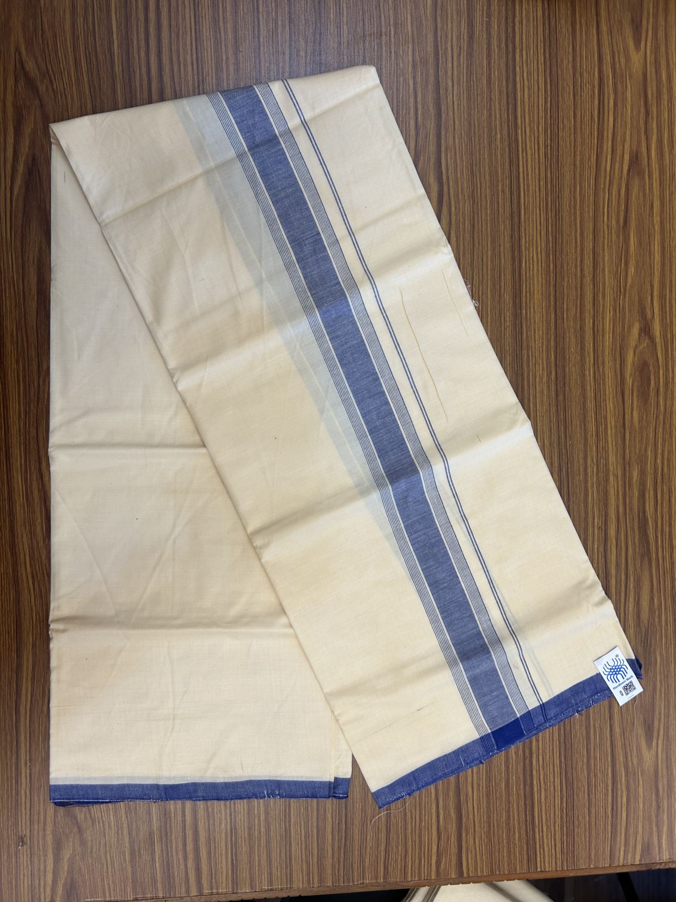 Kannur Kavi Dhoti - KaithariKada Kerala Handloom Single Mundu/Dhoti - 100% Pure Cotton 2/80x2/80s Thread - Kannur Light Yellow colour Body 2 inch Blue Striped Kara - 9 KK5333 KAL