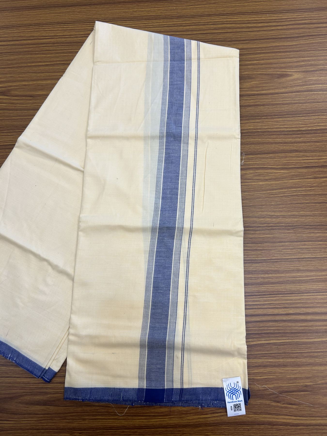 Kannur Kavi Dhoti - KaithariKada Kerala Handloom Single Mundu/Dhoti - 100% Pure Cotton 2/80x2/80s Thread - Kannur Light Yellow colour Body 2 inch Blue Striped Kara - 9 KK5333 KAL