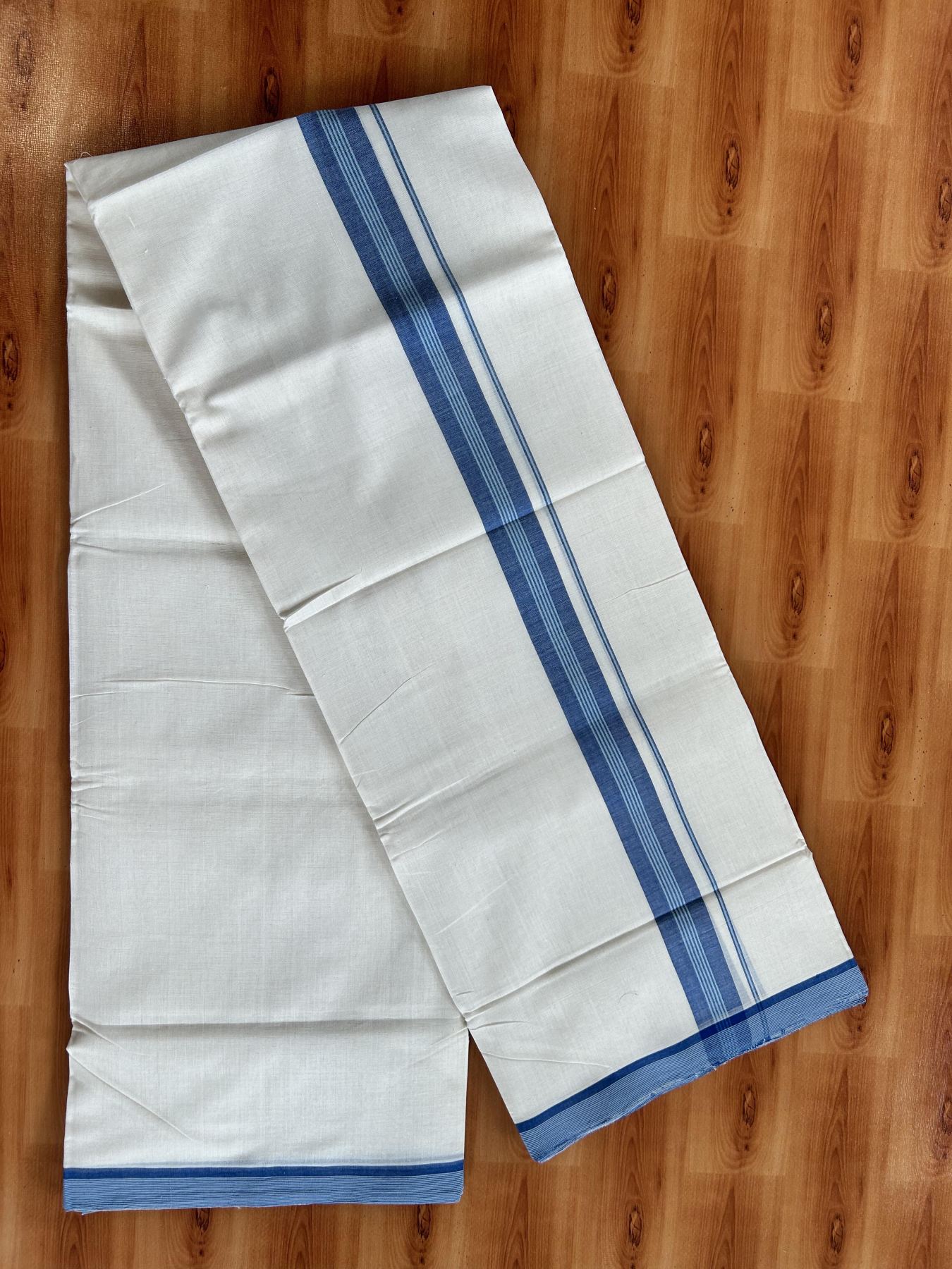 Double Off White (Unbleached) Mundu/Dhoti - 25% Discount! KaithariKada Handloom Unakkupaav - Kerala Handloom - Pure Cotton - 80x90 - 1.25 Inch Blue & Sky Blue Shaded Striped Kara 4 mtr (8.5 Muzham) - 15 KK5439 YAR