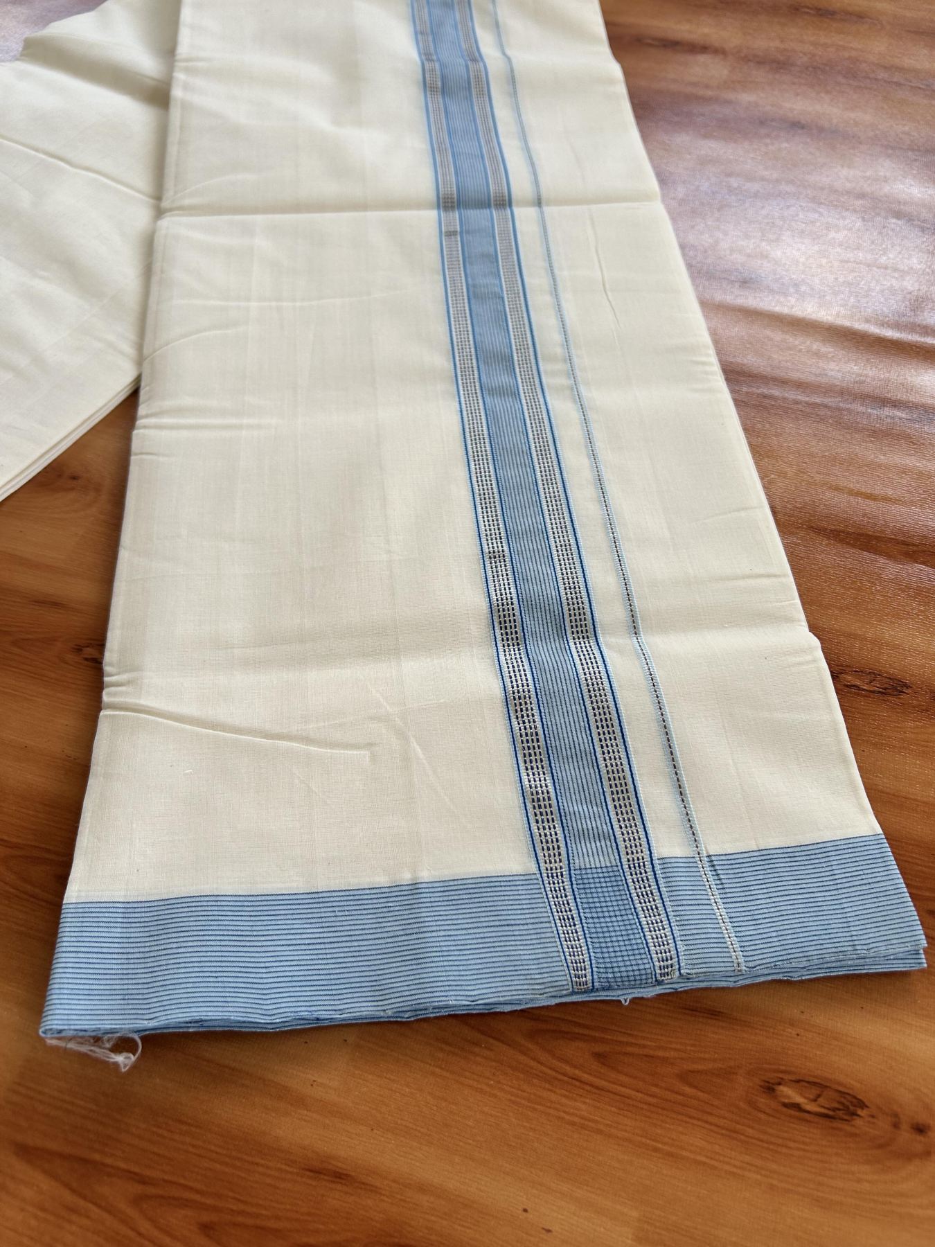 Double Off White (Unbleached) Mundu/Dhoti - 25% Discount!! KaithariKada Handloom Unakkupaav - Kerala Handloom - 100% Pure Cotton - 100x80 - 1.5 inch Light Blue & Dark Blue Silver Kasav Striped Kara 4 meter (8.5 muzham) - 25 KK5436 REA