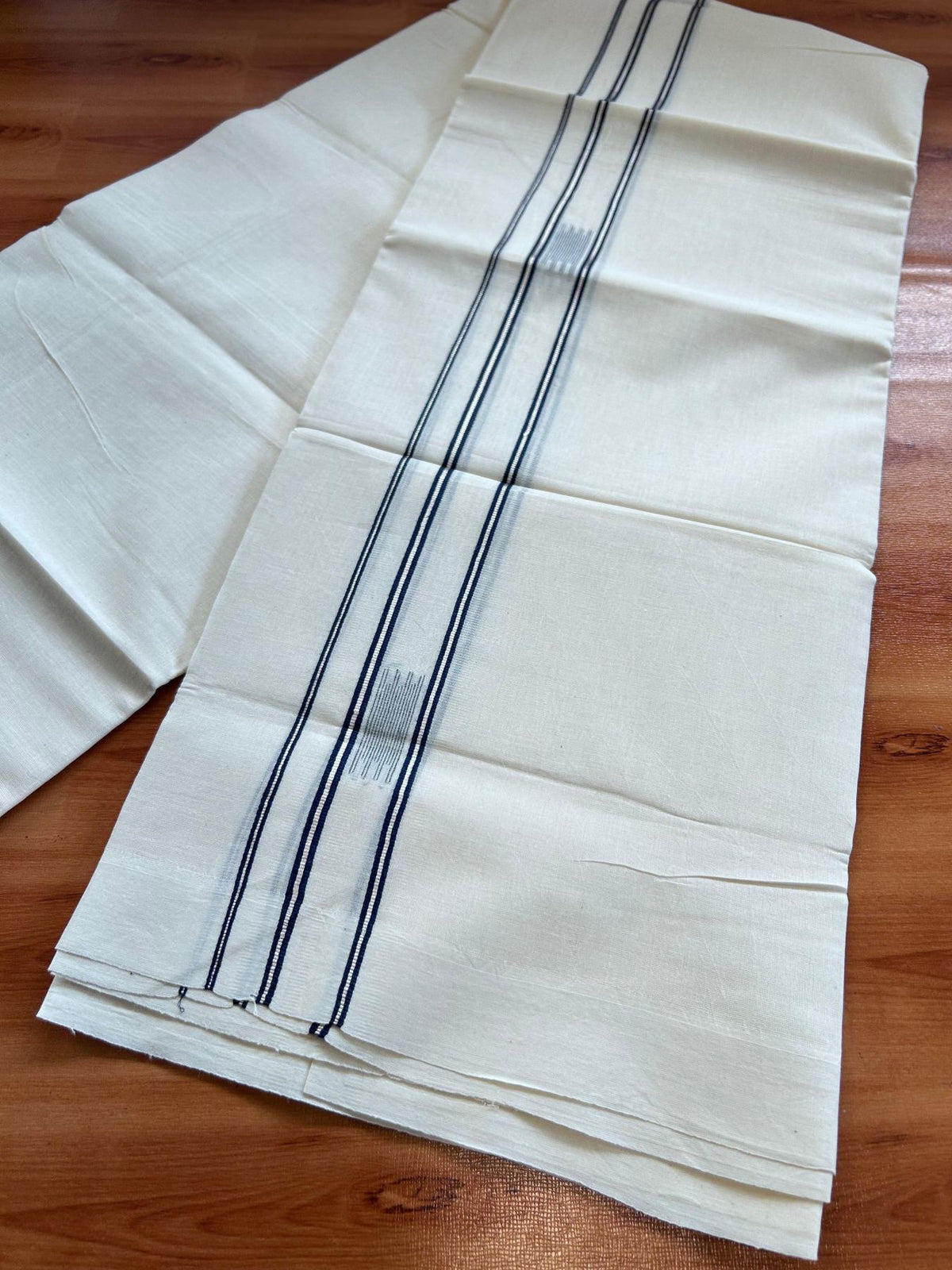 Double Off White (Unbleached) Mundu/Dhoti- 20% Discount! KaithariKada Pure Cotton - 100X80 - 1.25 inch Silver Kasav & Navy Blue Jaquard Design Kara - 4 mtr (8.5 Muzham) - 4 KK5510 VAS