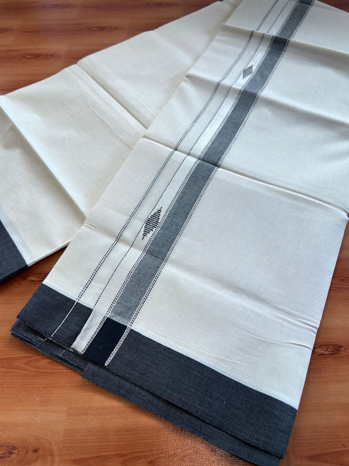 Double Off White (Unbleached) Mundu/Dhoti- 20% Discount! KaithariKada Pure Cotton - 100X80 - 1.5 inch Silver Kasav & Black Jaquard Design Kara - 4 mtr (8.5 Muzham) - 6 KK5510 VAS