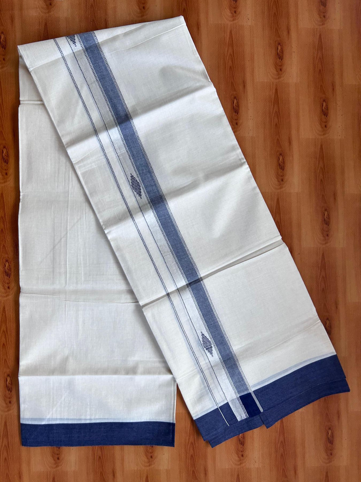 Double Off White (Unbleached) Mundu/Dhoti- 20% Discount! KaithariKada Pure Cotton - 100X80 - 1.5 inch Silver Kasav & Navy Blue Jaquard Design Kara - 4 mtr (8.5 Muzham) - 7 KK5510 VAS