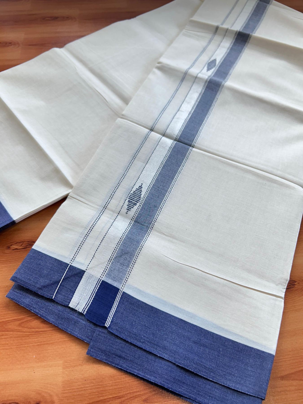 Double Off White (Unbleached) Mundu/Dhoti- 20% Discount! KaithariKada Pure Cotton - 100X80 - 1.5 inch Silver Kasav & Navy Blue Jaquard Design Kara - 4 mtr (8.5 Muzham) - 7 KK5510 VAS