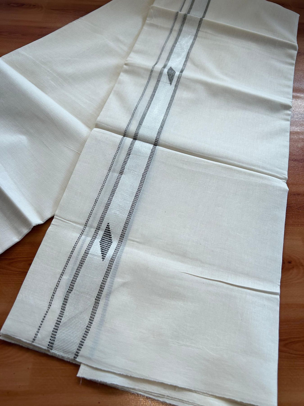 Double Off White (Unbleached) Mundu/Dhoti- 20% Discount! KaithariKada Pure Cotton - 100X80 - 1 inch Silver Kasav & Black Jaquard Design Kara - 4 mtr (8.5 Muzham) - 8 KK5510 VAS