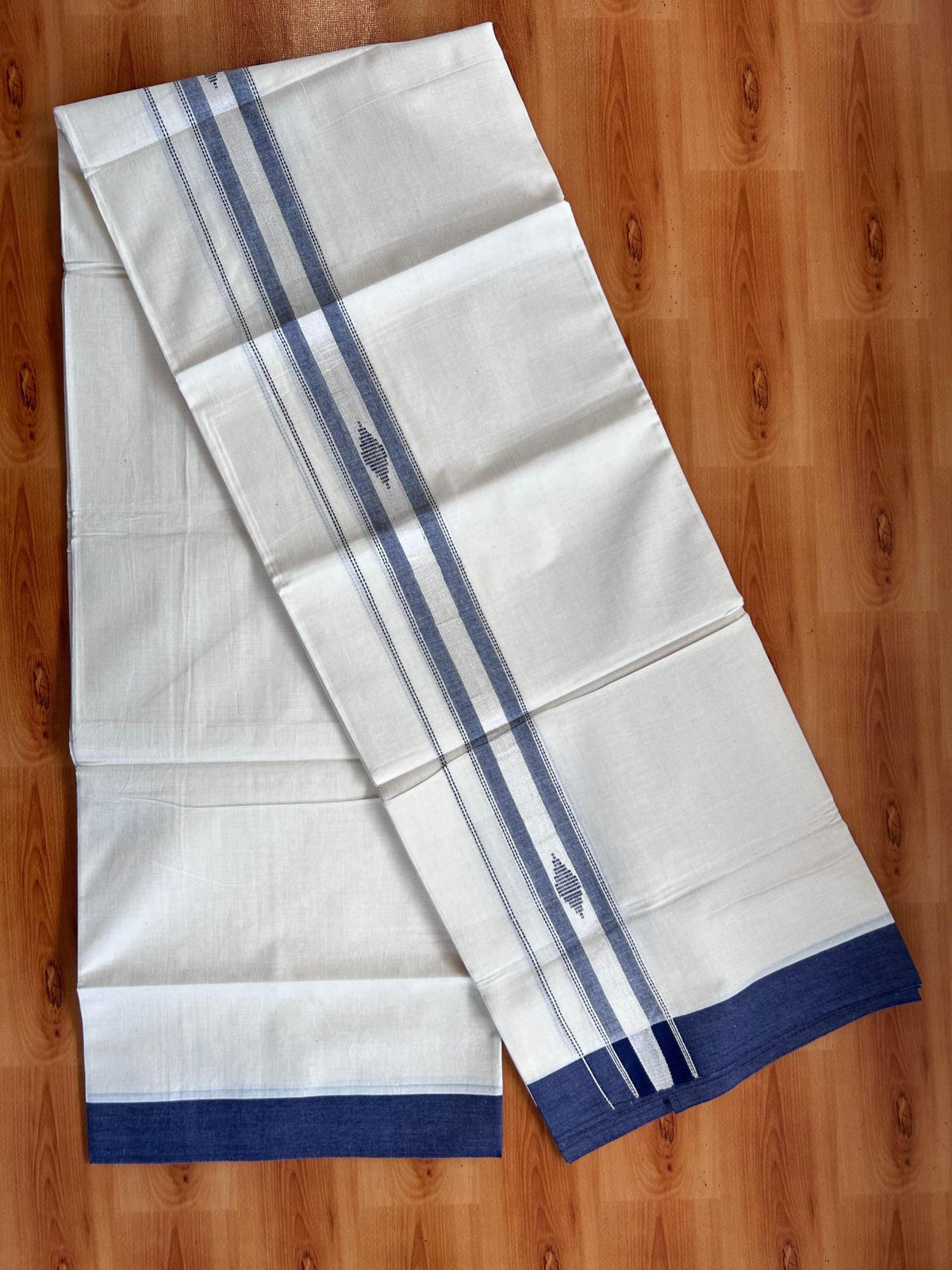 Double Off White (Unbleached) Mundu/Dhoti- 20% Discount! KaithariKada Pure Cotton - 100X80 - 1.5 inch Silver Kasav & Navy Blue Jaquard Design Kara - 4 mtr (8.5 Muzham) - 10 KK5510 VAS