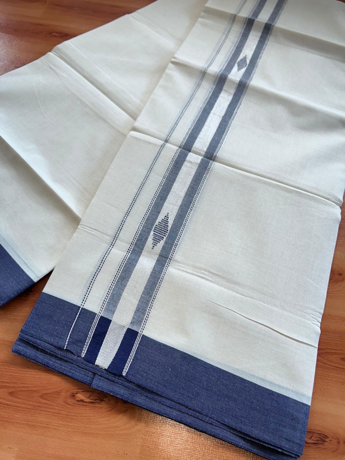 Double Off White (Unbleached) Mundu/Dhoti- 20% Discount! KaithariKada Pure Cotton - 100X80 - 1.5 inch Silver Kasav & Navy Blue Jaquard Design Kara - 4 mtr (8.5 Muzham) - 10 KK5510 VAS