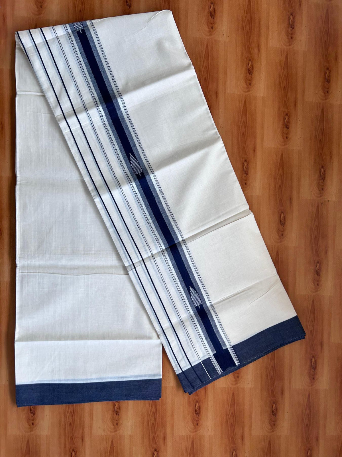 Double Off White (Unbleached) Mundu/Dhoti- 20% Discount! KaithariKada Pure Cotton - 100X80 - 5.5 inch Silver Kasav & Navy Blue Jaquard Design Kara - 4 mtr (8.5 Muzham) - 16 KK5510 VAS