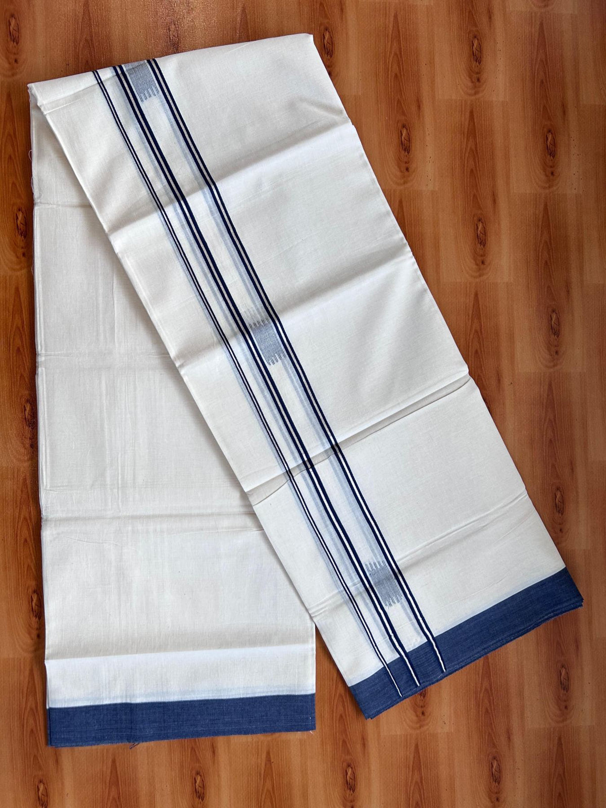 Double Off White (Unbleached) Mundu/Dhoti- 20% Discount! KaithariKada Pure Cotton - 100X80 - 1.5 inch Silver Kasav & Navy Blue Jaquard Design Kara - 4 mtr (8.5 Muzham) - 20 KK5510 VAS