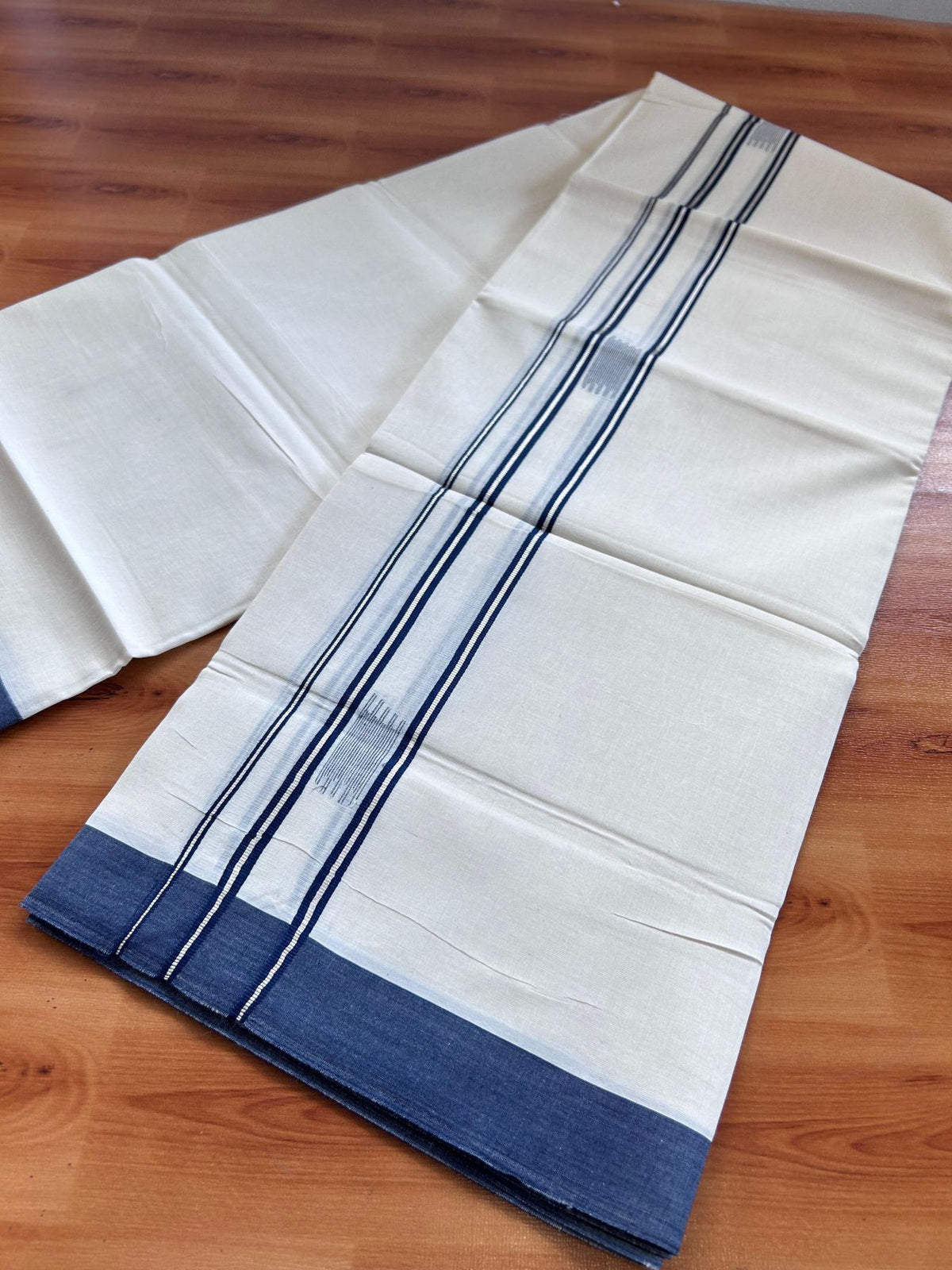 Double Off White (Unbleached) Mundu/Dhoti- 20% Discount! KaithariKada Pure Cotton - 100X80 - 1.5 inch Silver Kasav & Navy Blue Jaquard Design Kara - 4 mtr (8.5 Muzham) - 20 KK5510 VAS