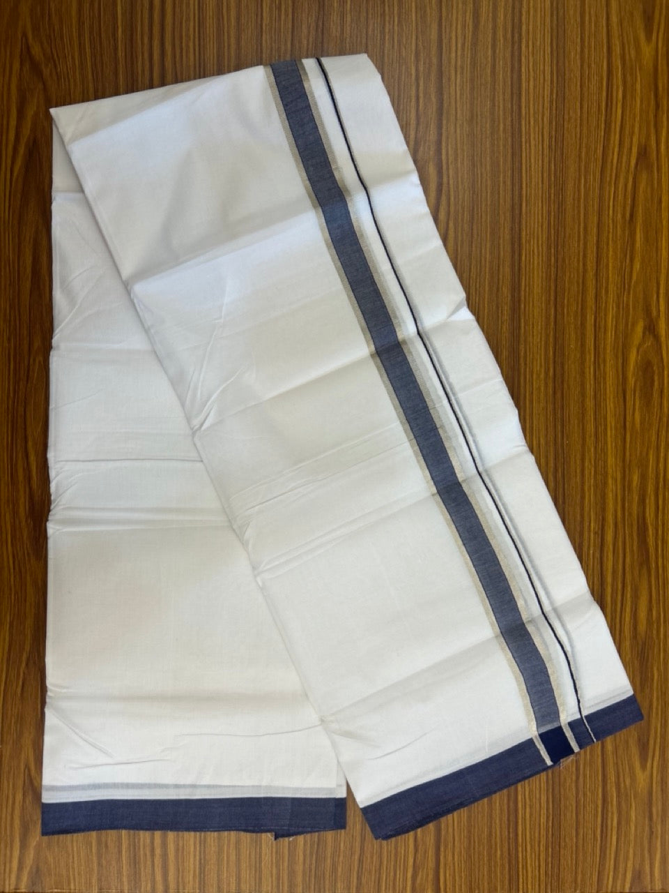 KaithariKada Handloom Millpaav Balaramapuram - 100% Pure Cotton Double Mundu/Dhoti Pure white - 80x90 - 1.25 inch Silver Kasav & Navy Blue Shaded Kara 4 mtr (8.5 Muzham) - 35 KK5263 YAR