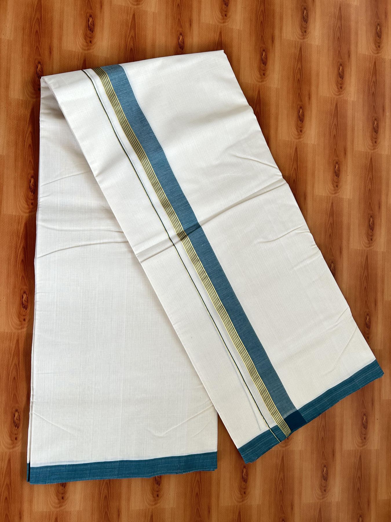 Double Off White (Unbleached) Mundu/Dhoti- 25% Discount! KaithariKada Handloom Millpaav - Kerala Handloom - Cotton - 80x90 - 1.25 inch Gold Kasav & Peacock Blue Shaded Striped Kara 4.50 meter (10 Muzham) - 27 KK5396 RAM