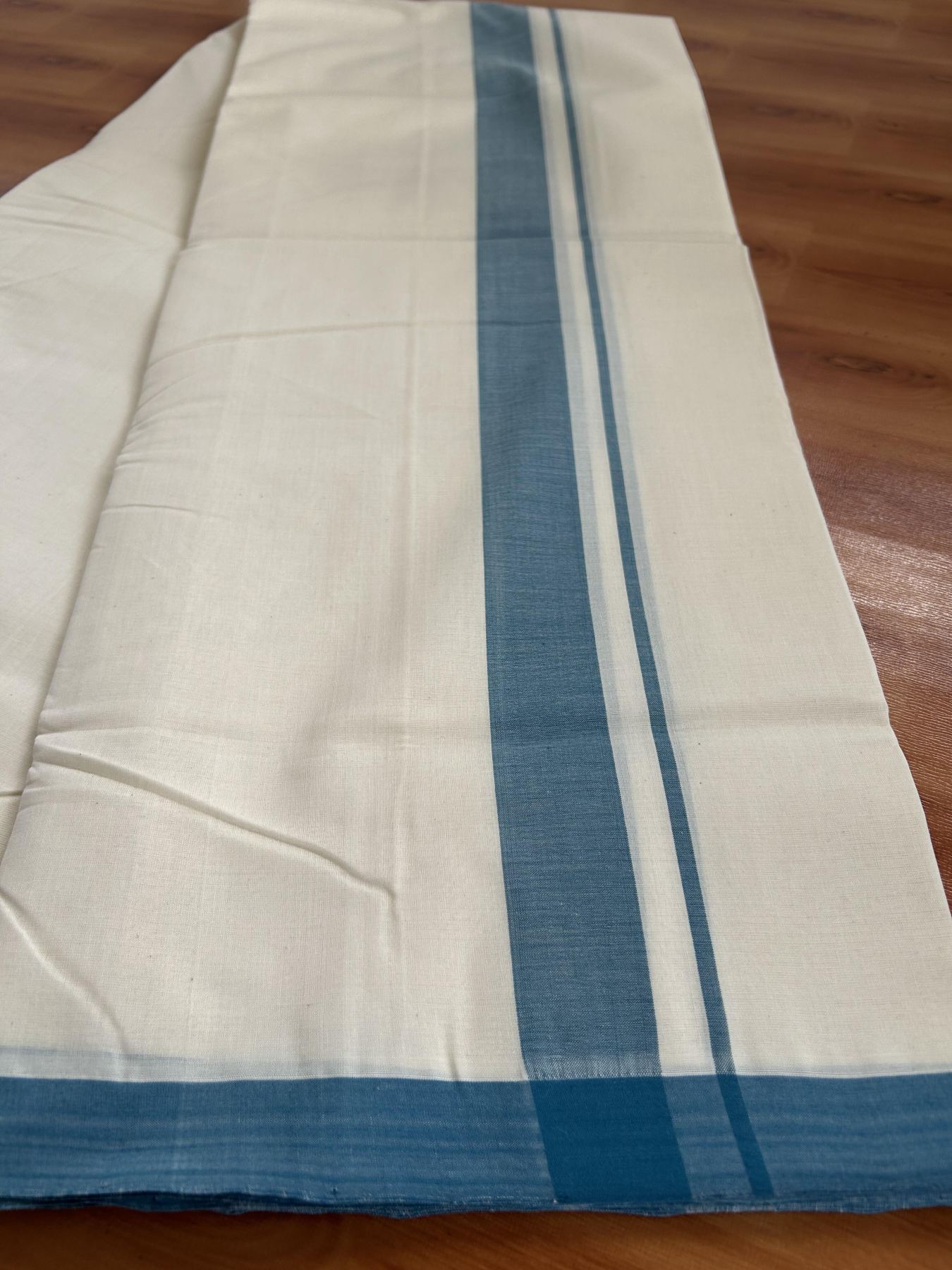 Double Off White (Unbleached) Mundu/Dhoti- 25% Discount! KaithariKada Handloom Millpaav - Kerala Handloom - Cotton - 80x90 - 1.25 inch Peacock Blue Mulloth Kara 4 meter (8.5 Muzham) - 9 KK5396 RAM