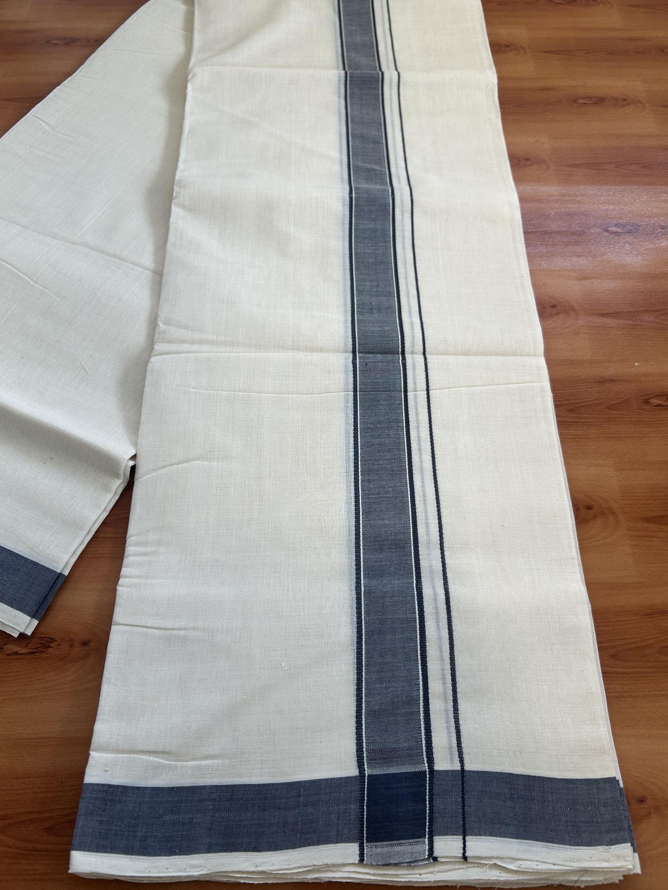 Double Off White (Unbleached)  Mundu/Dhoti- 25% Discount KaithariKada Handloom Unakkupaav - Kerala Handloom - 100% Pure Cotton (100x80) - 1 Inch Greyish Navy Blue Shaded Kara 3.80 mtr (8 muzham) - 2 KK5397 ELA