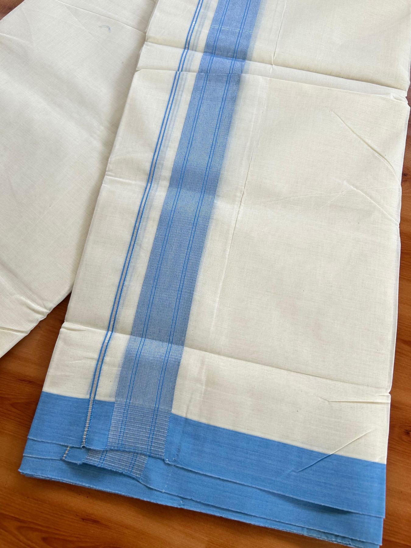 Double Off White (Unbleached) Mundu/Dhoti - 20% Discount! Kaitharikada Pure Cotton - 80x80 - 1.5 Inch Silver Kasav Light Blue Striped Kara 4 mtr (8.5 muzham) - 16 KK5489 MRH