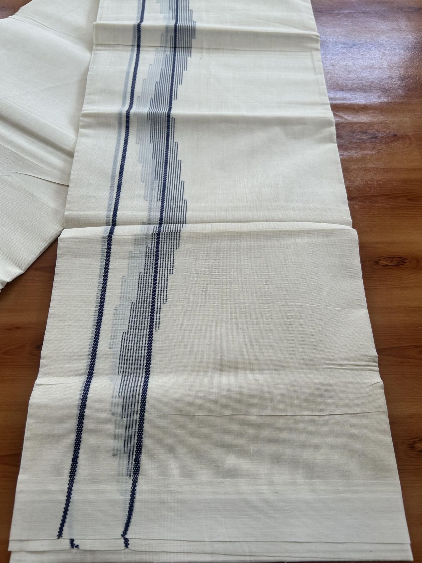 Double Off White (Unbleached) Mundu/Dhoti- 20% Discount! KaithariKada Pure Cotton - 100X80 - 1.5 inch Navy Blue Stripes Jacquard Design Kara - 4 mtr (8.5 Muzham) - 25 KK5452 THI