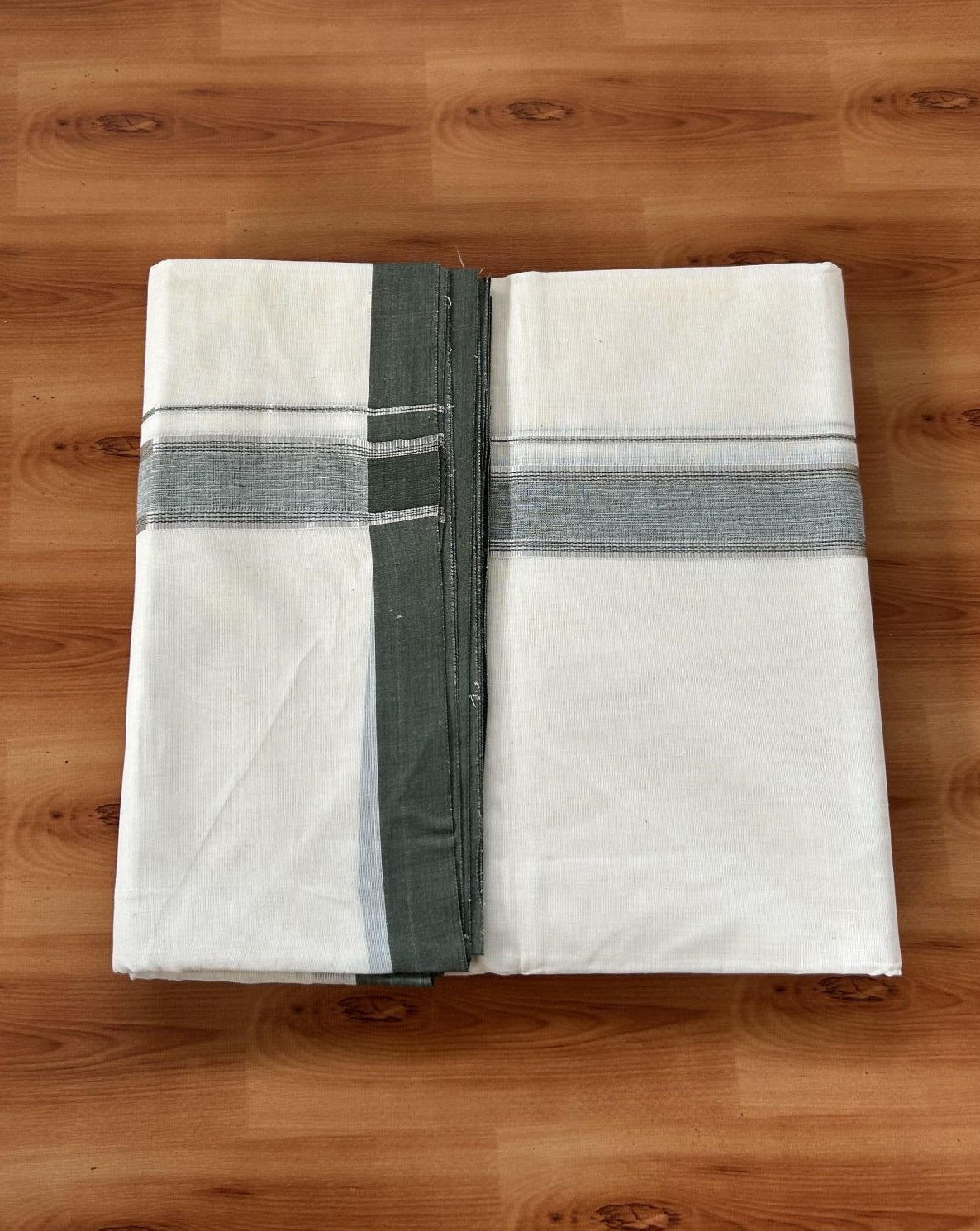 Double Off white - (Unbleached) - Mundu/Dhoti- 20% Discount KaithariKada Balaramapuram 100% Cotton - 100x100 - 1.25 inch Silver Kasav & Olive Green Shaded Striped Kara - 4mtr (8.5 muzham)- 38 KK5392 ASH
