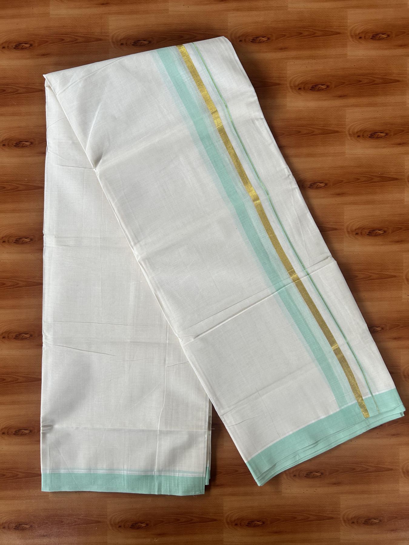 Double Off White (Unbleached) Mundu/Dothi- 20% Discount! Kaitharikada 100% Pure Cotton - 100x80 - 1.5 inch Gold Kasav & Mint Green Shaded Kara 4 mtr (8.5 muzham) - 5 KK5455 THI